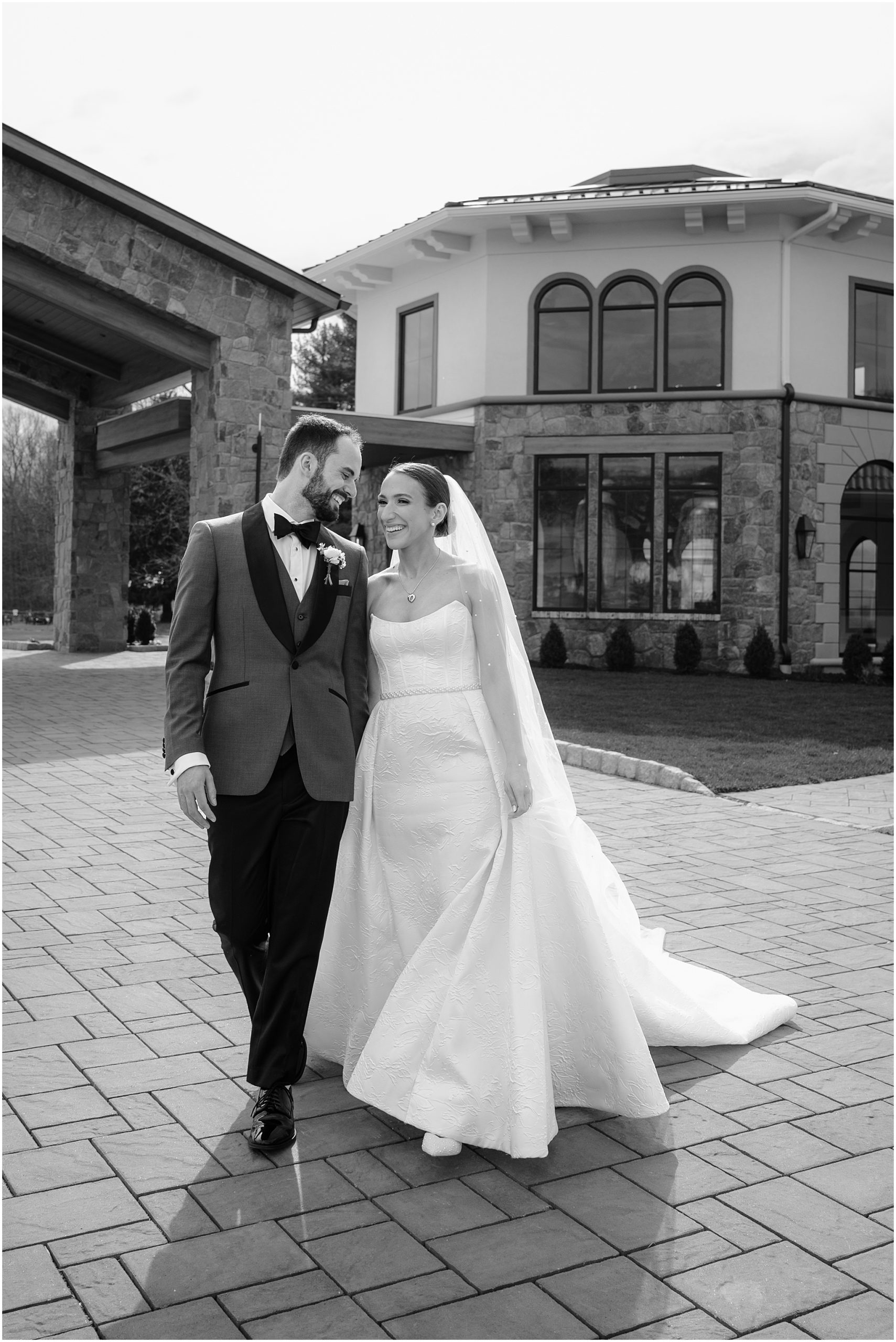 Couple holding hands while walking at Perona Farms.
