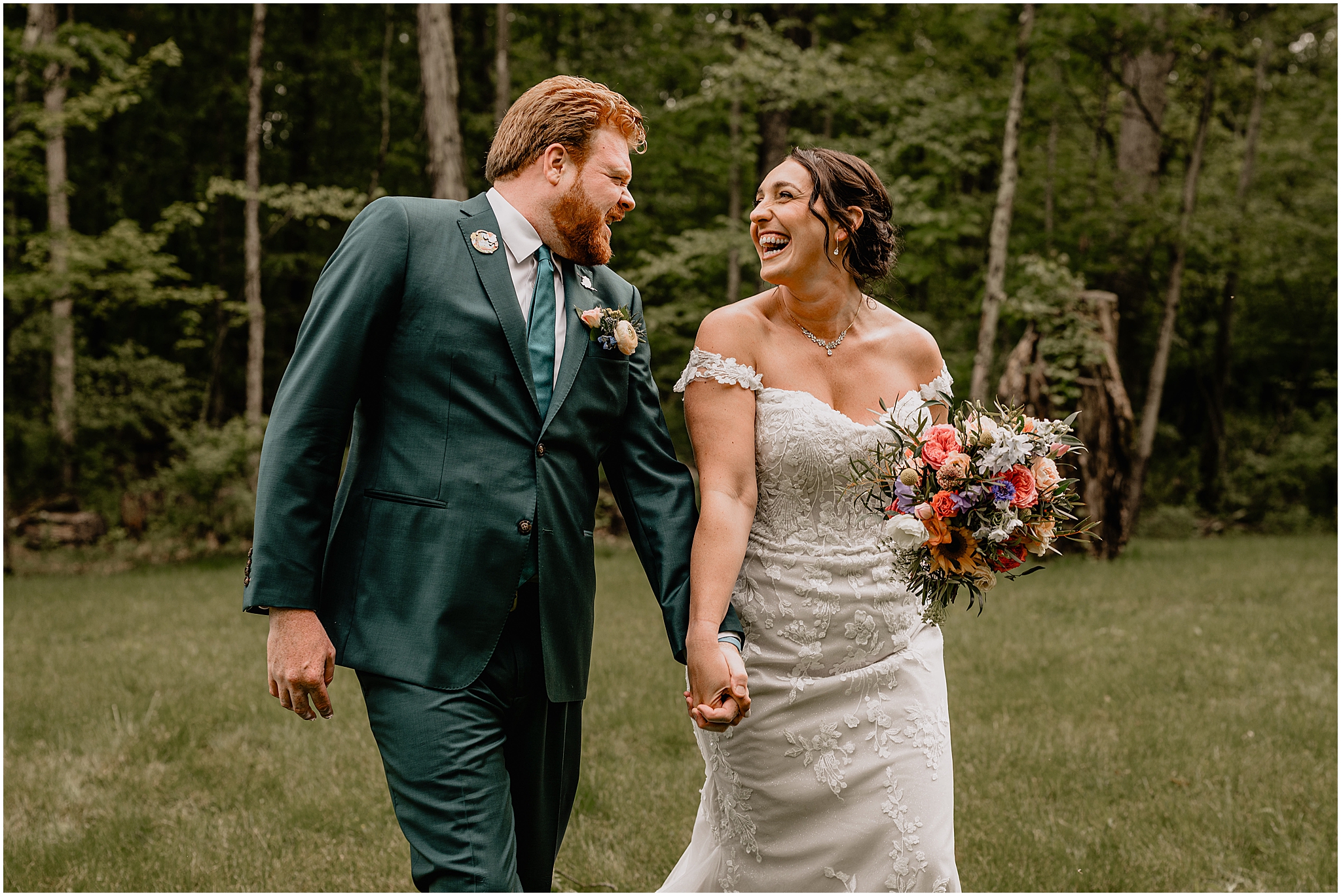 couple's holding hands at the Camp Lindenmere