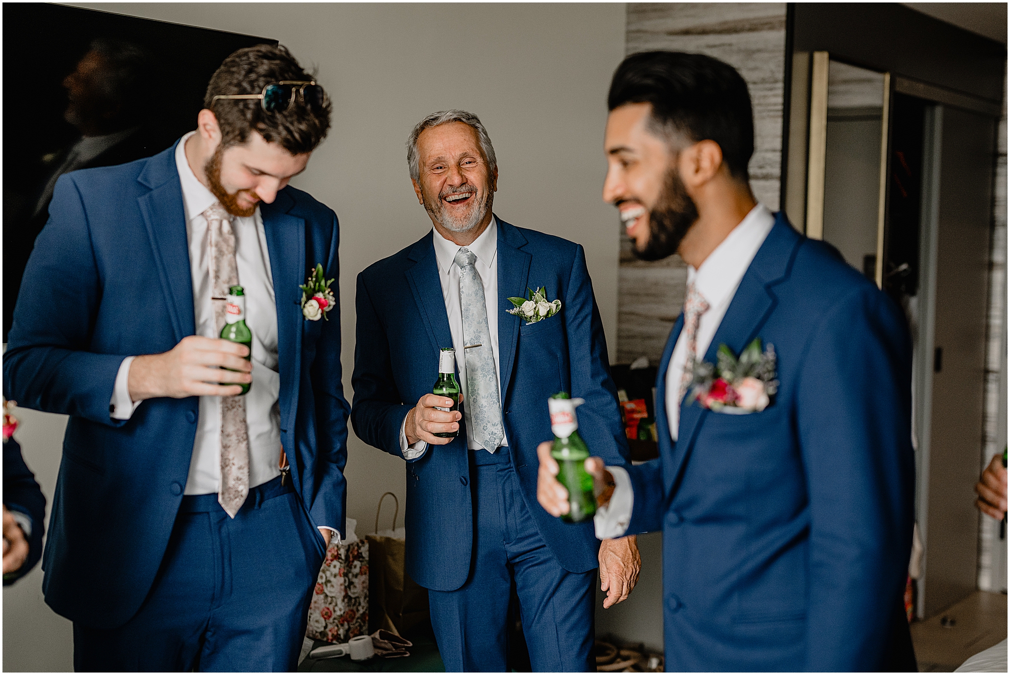 Groom and groomsmen having a toast before the Unforgettable Porta Montclair Wedding.