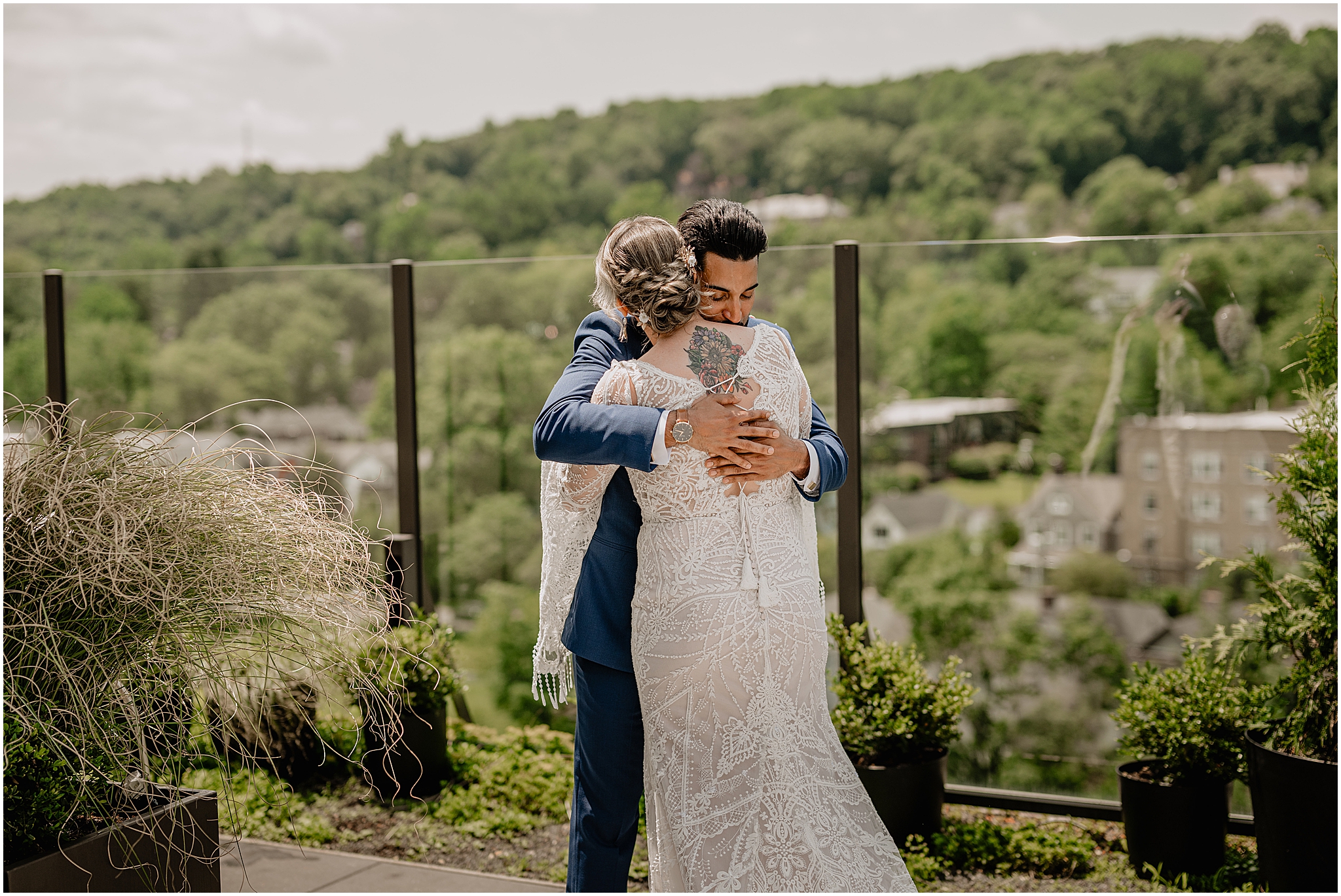 Bride and groom embrace after their first look at their unforgettable Porta Montclair wedding.
