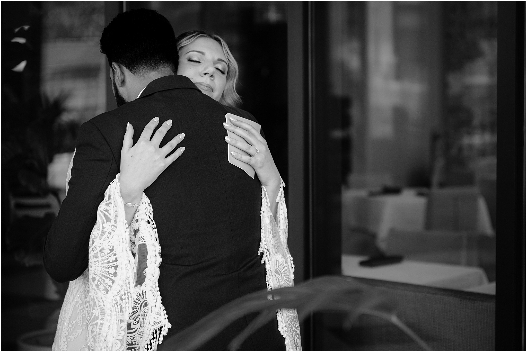 Bride and groom embrace after their first look at their unforgettable Porta Montclair wedding.