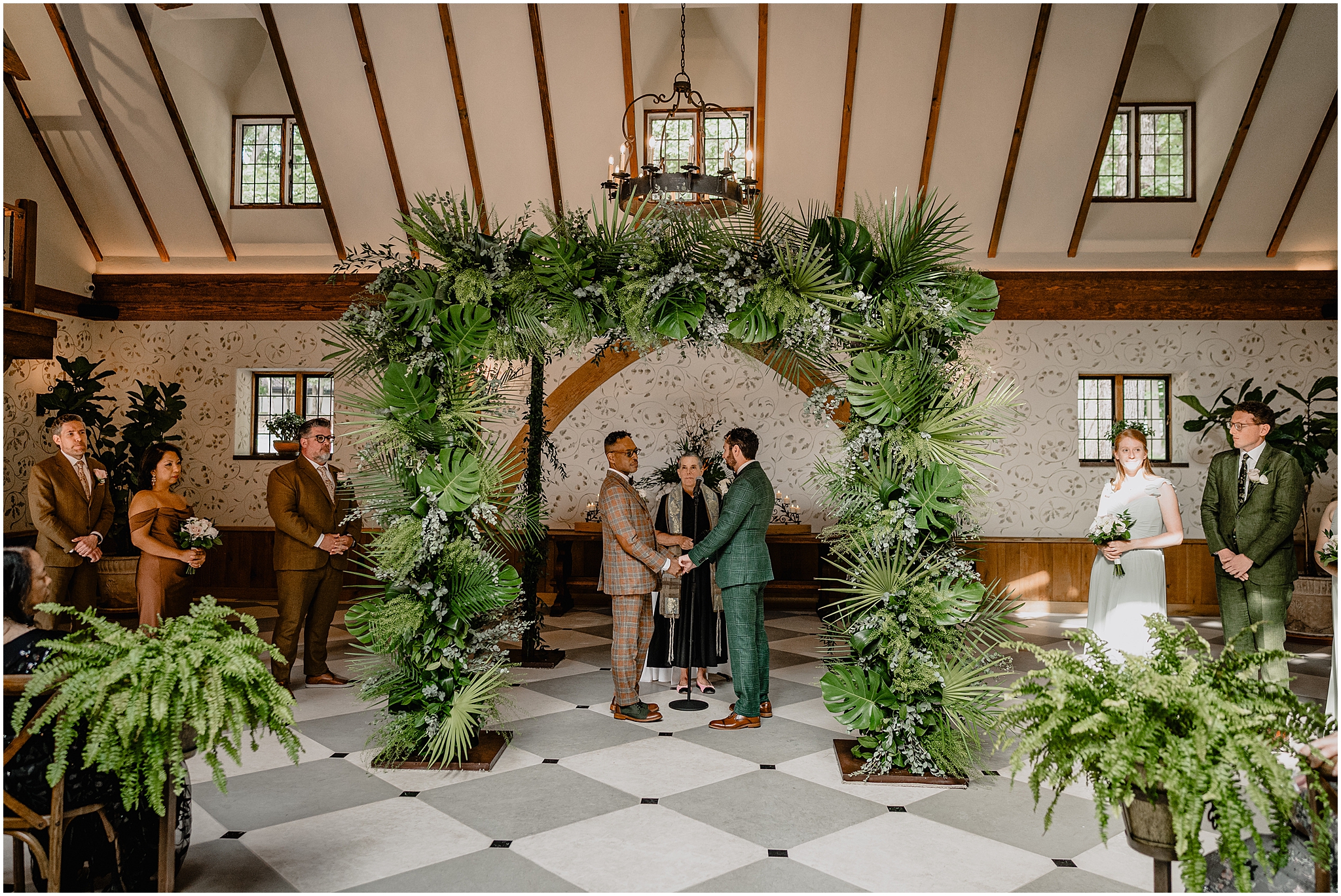 Couple at the altar during their Joyful Pleasantdale Chateau Wedding, sharing an emotional and heartfelt moment.