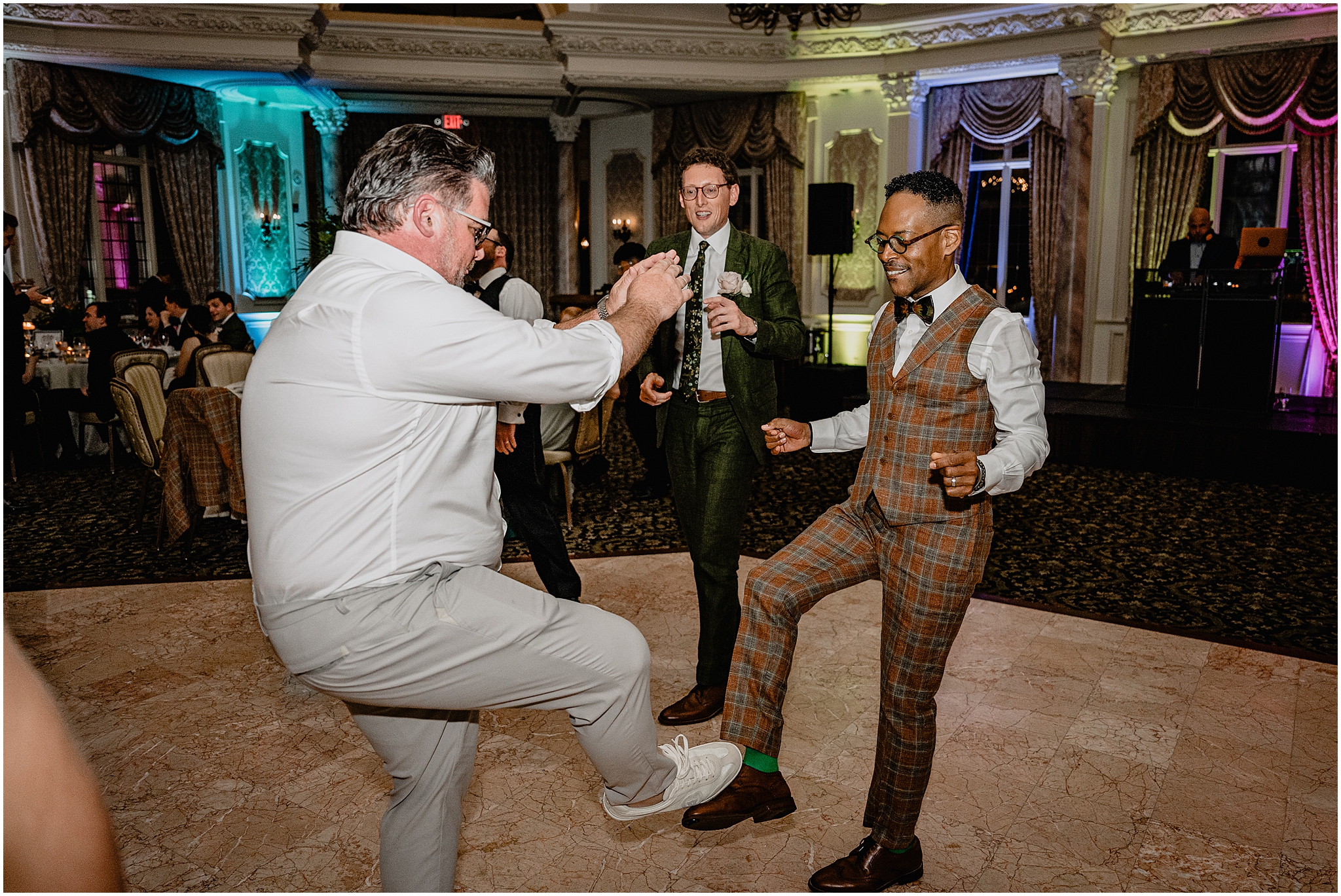Couple dancing at their Joyful Pleasantdale Chateau Wedding, filled with energy, joy, and excitement.