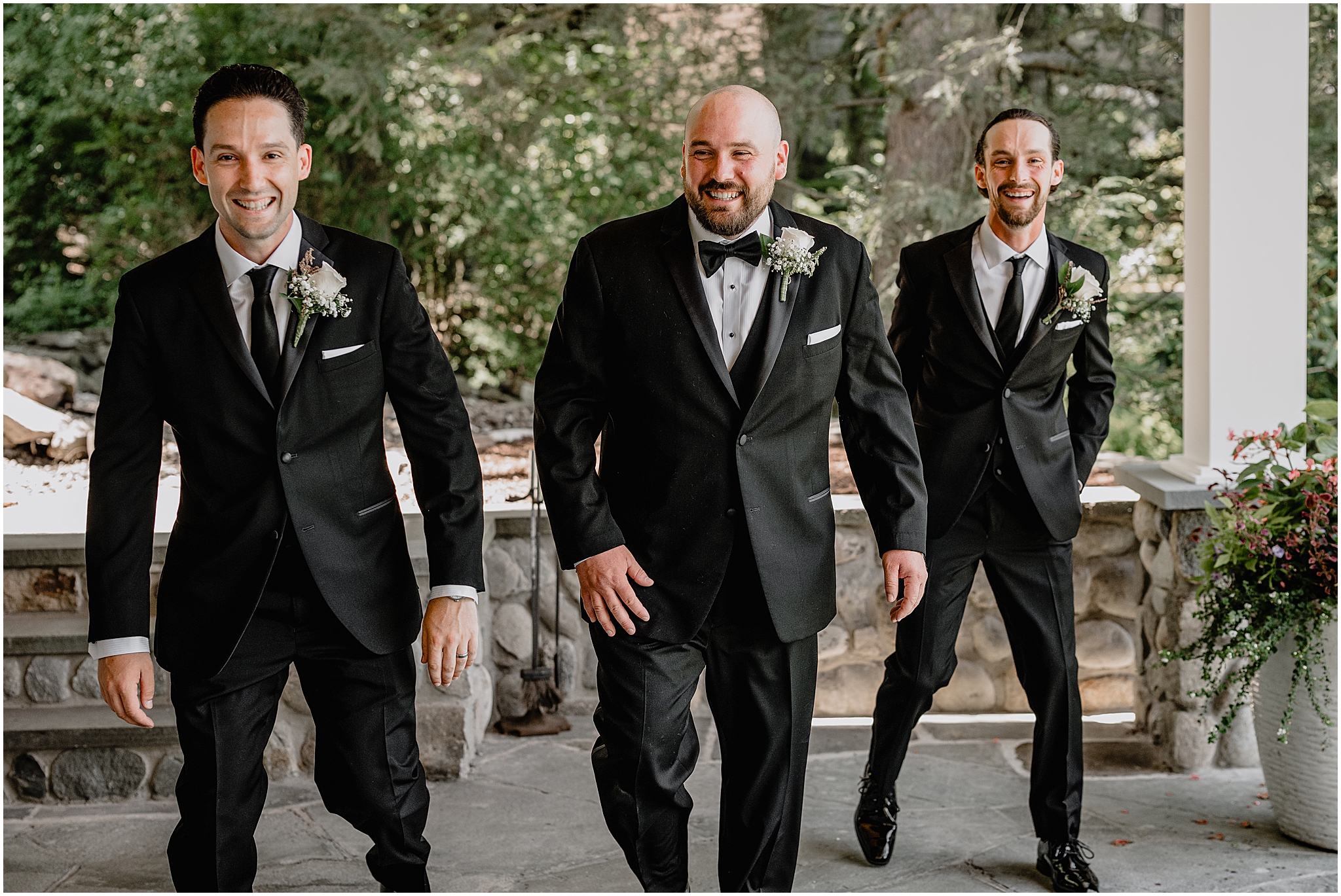 Groom with his groomsmen sharing candid moments before the Summer Park Chateau Wedding celebration.