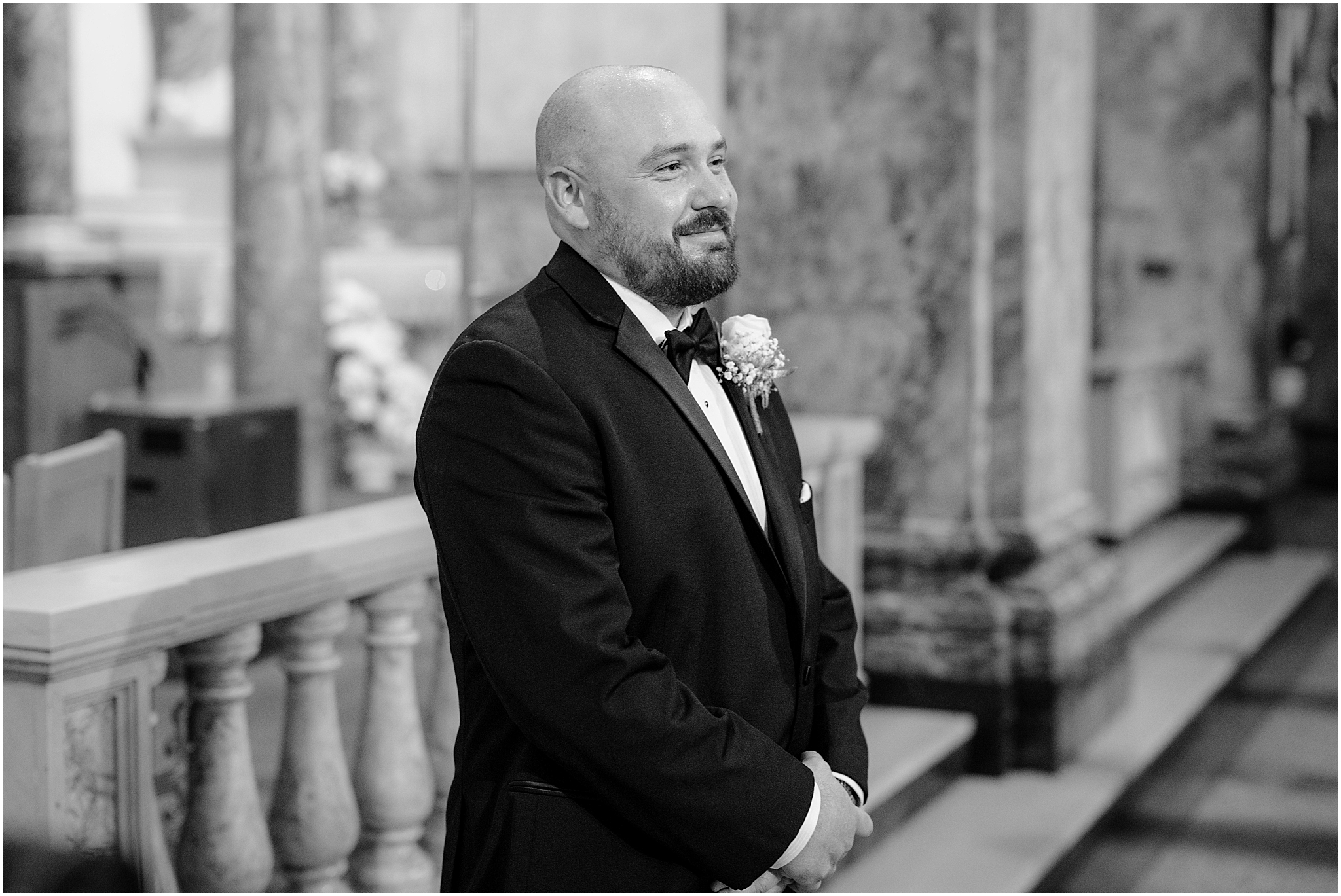 Groom waiting at the altar during his Summer Park Chateau Wedding, capturing anticipation and emotion before the ceremony begins.