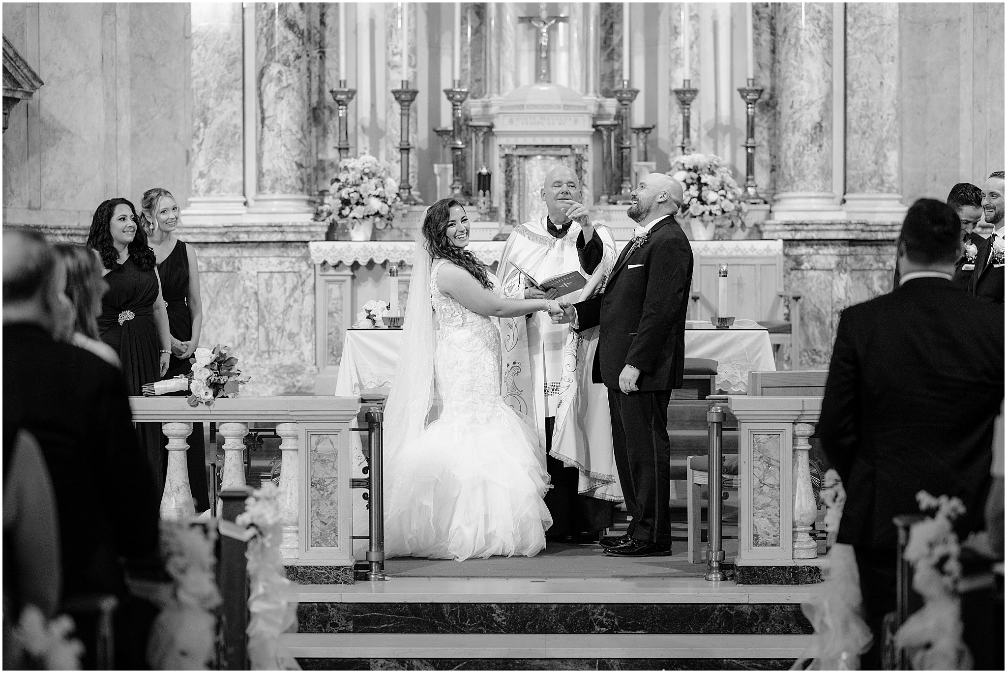 Couple at the altar during their Summer Park Chateau Wedding, capturing the heartfelt moment they exchange vows.
