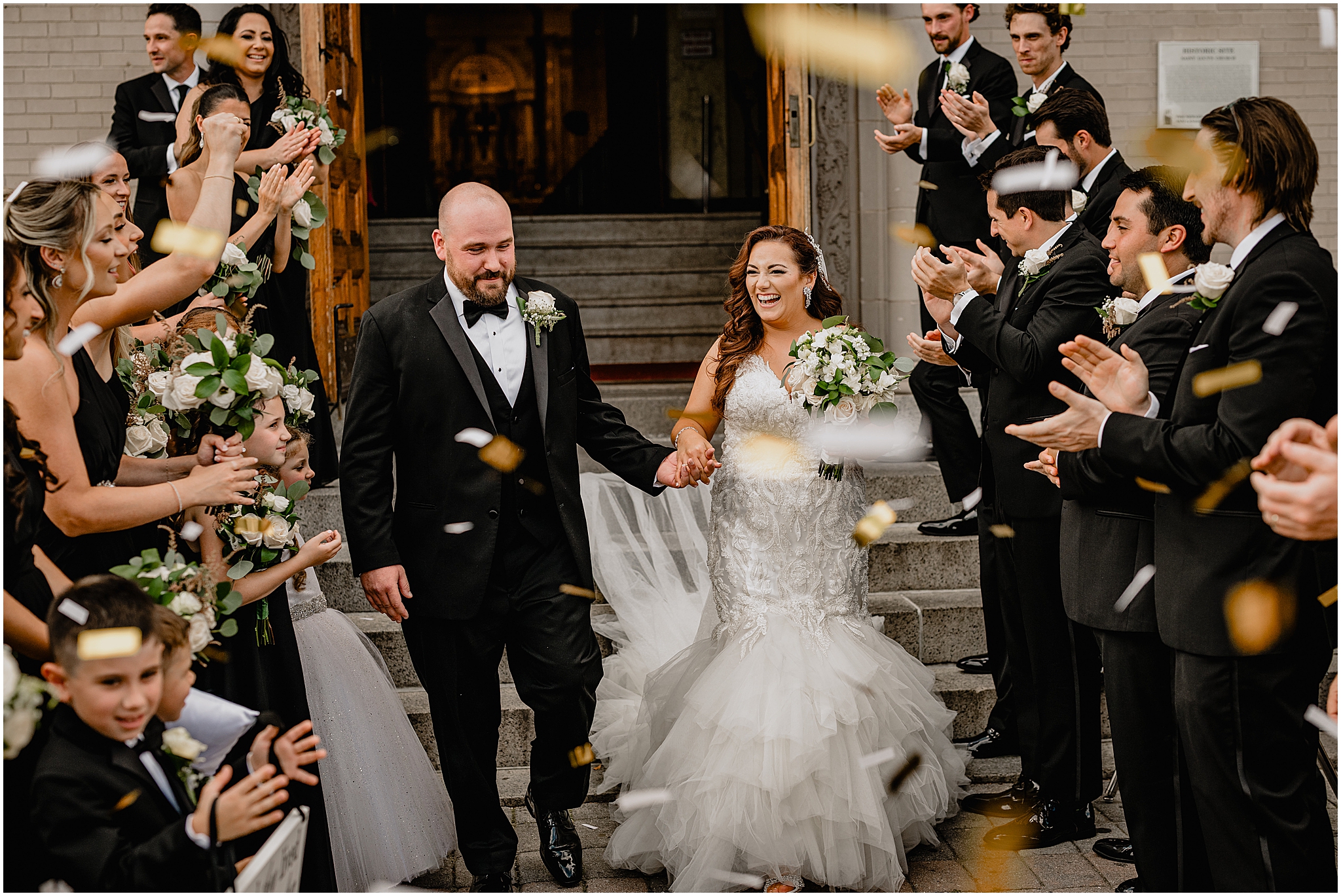 Happy couple after their ceremony at their Summer Park Chateau Wedding, celebrating the joy of just being married.