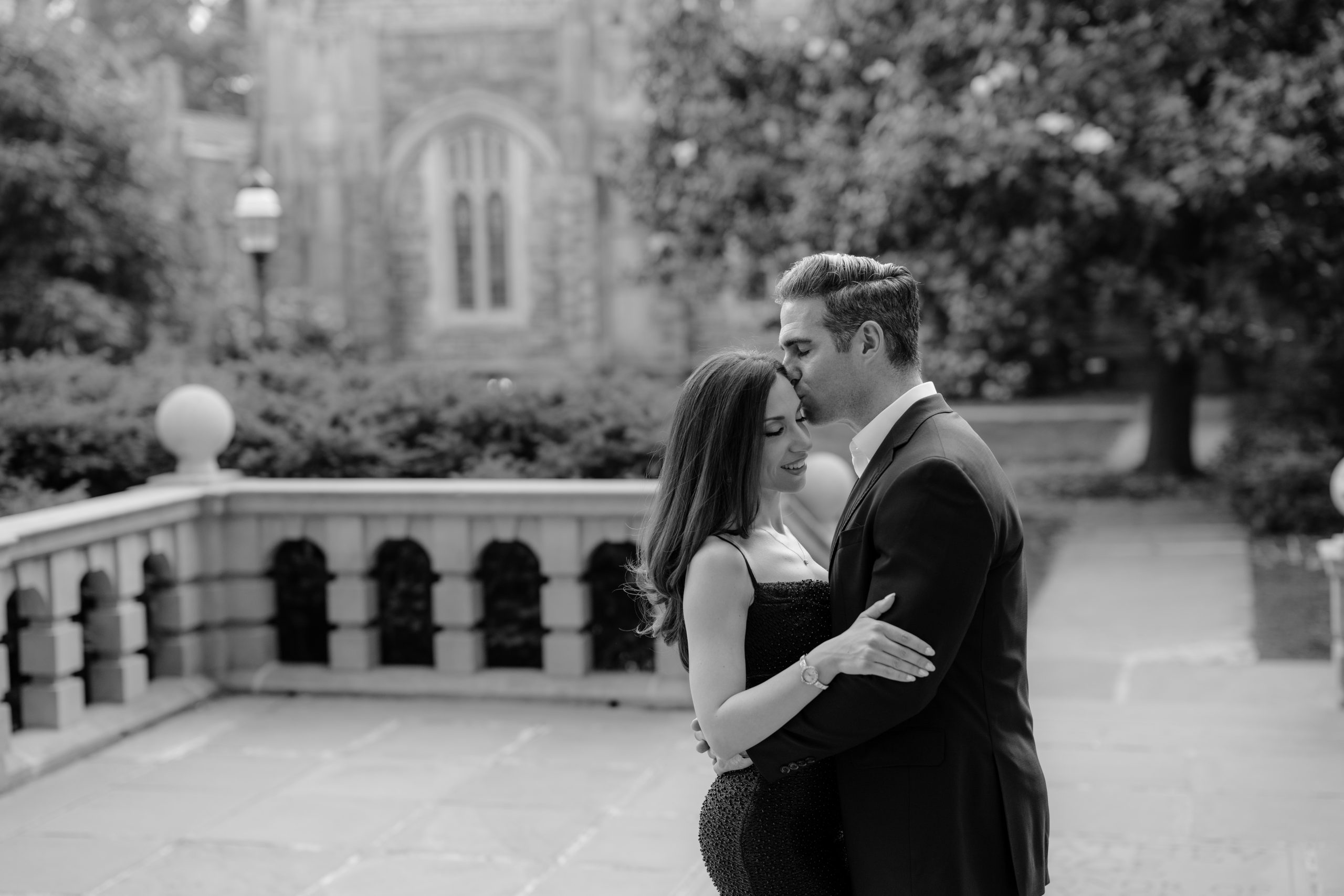 Engaged couple sharing a romantic moment during their Princeton University engagement session.