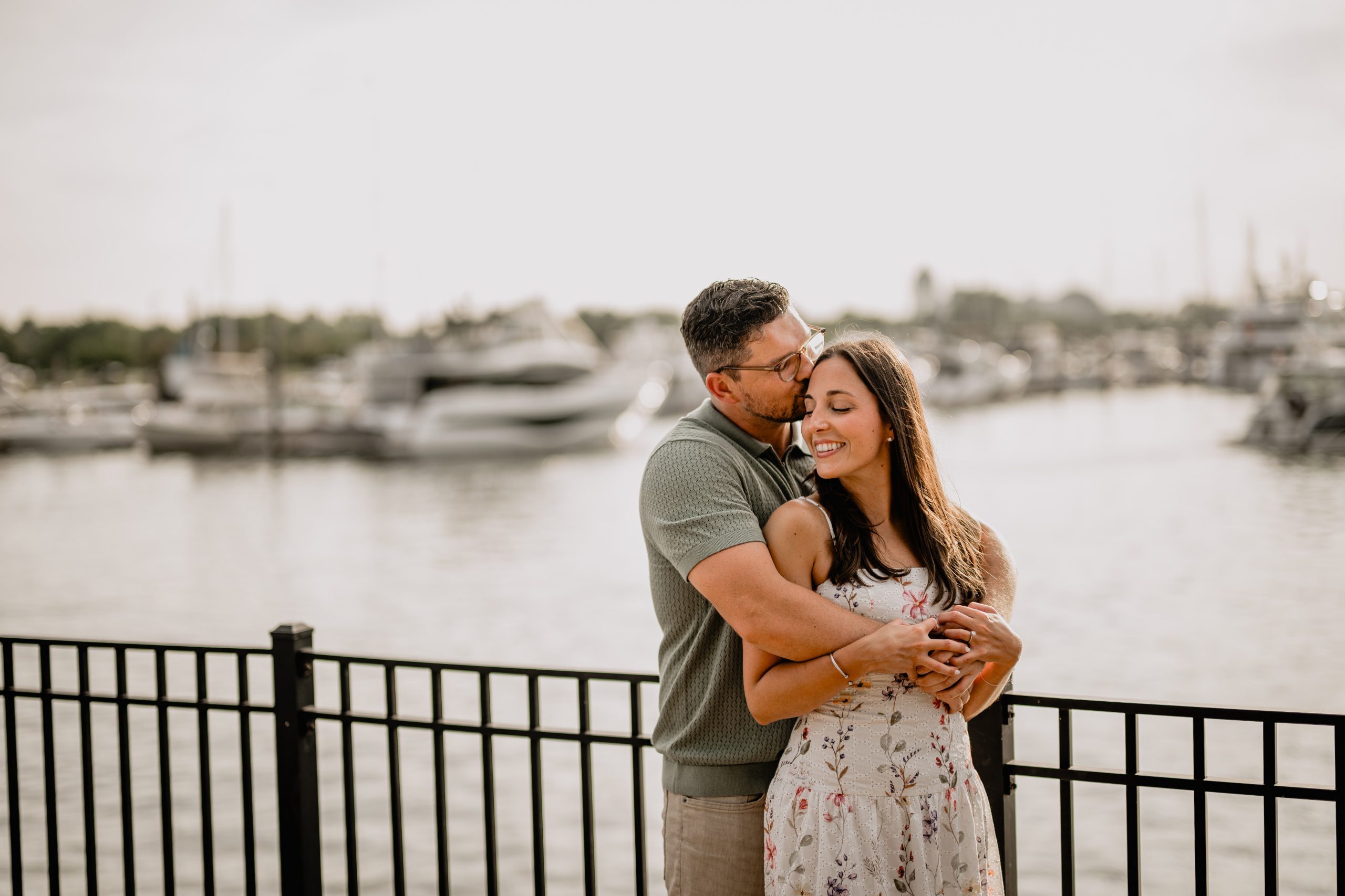 Couple hugging during their Jersey City Engagement at Paulus Hook.
