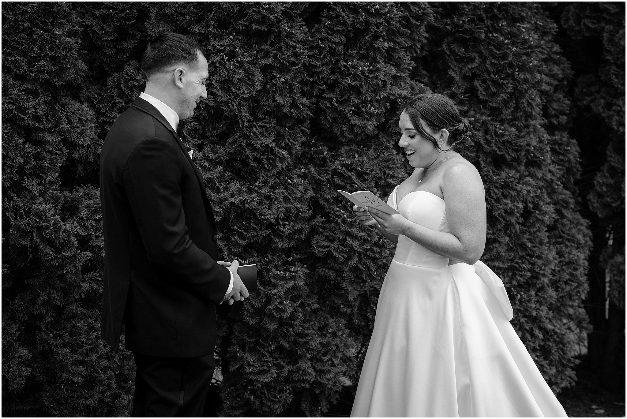 Couple reading their vows to each other before their wedding at Rock Island Lake Club.