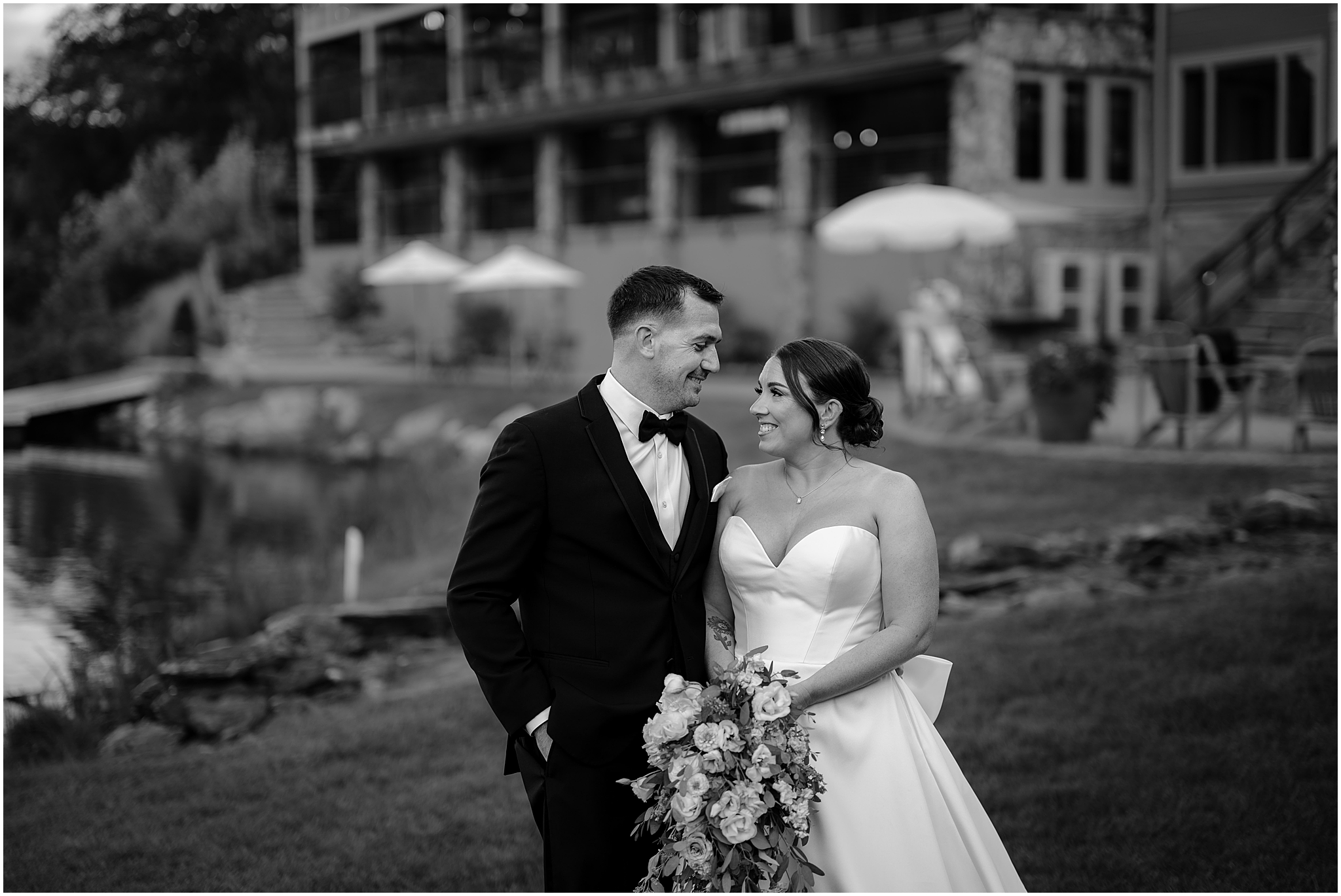 Couple portrait by the lake at their wedding at Rock Island Lake Club.