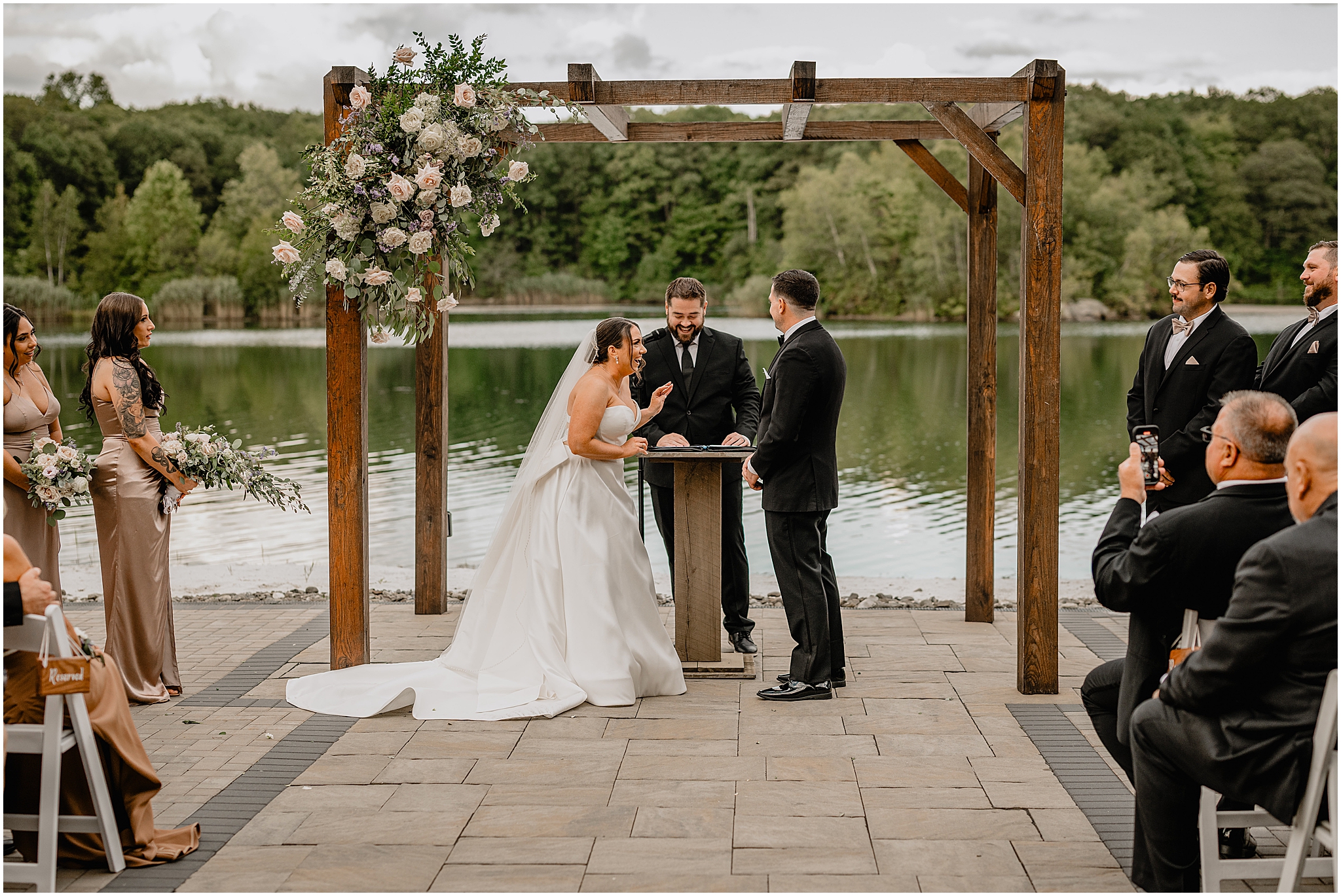 Couple at the altar at their wedding at Rock Island Lake Club.