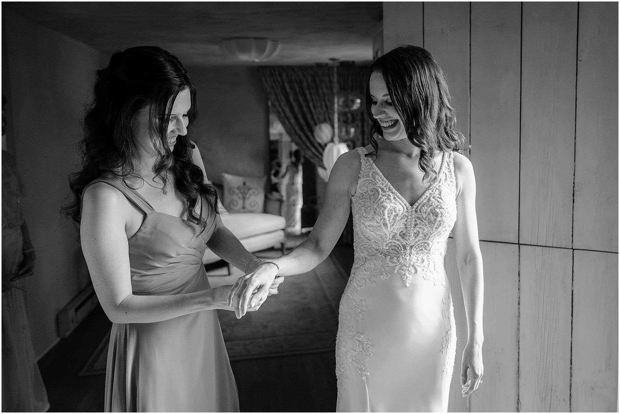 Bride getting ready before her Summer Crossed Keys Estate wedding.