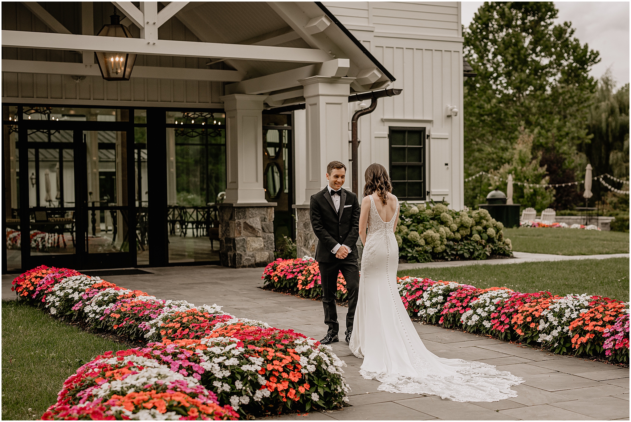 Couple’s first look during their Summer Crossed Keys Estate wedding.