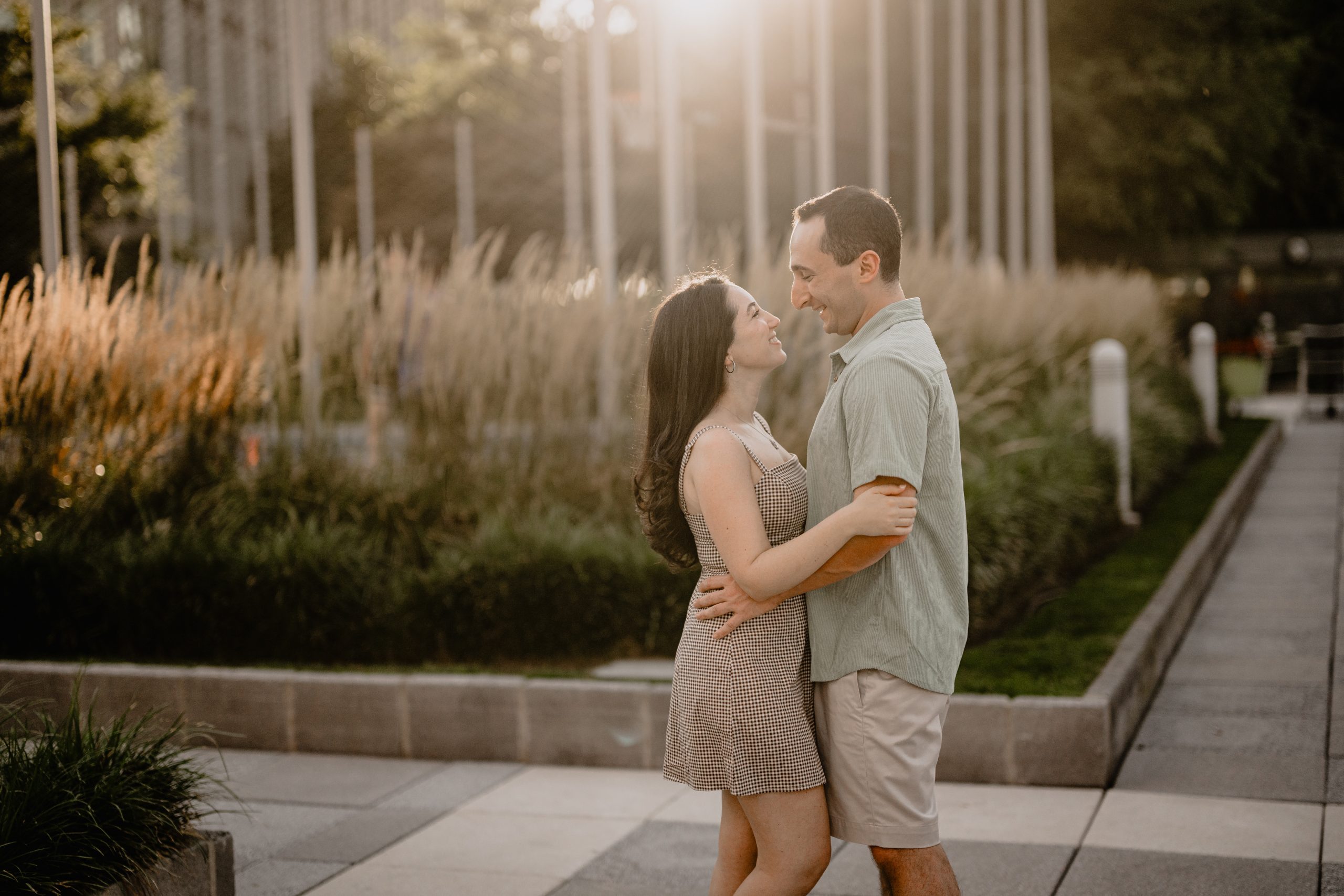 A romantic Jersey City & Home Engagement moment of the couple looking lovingly at each other.