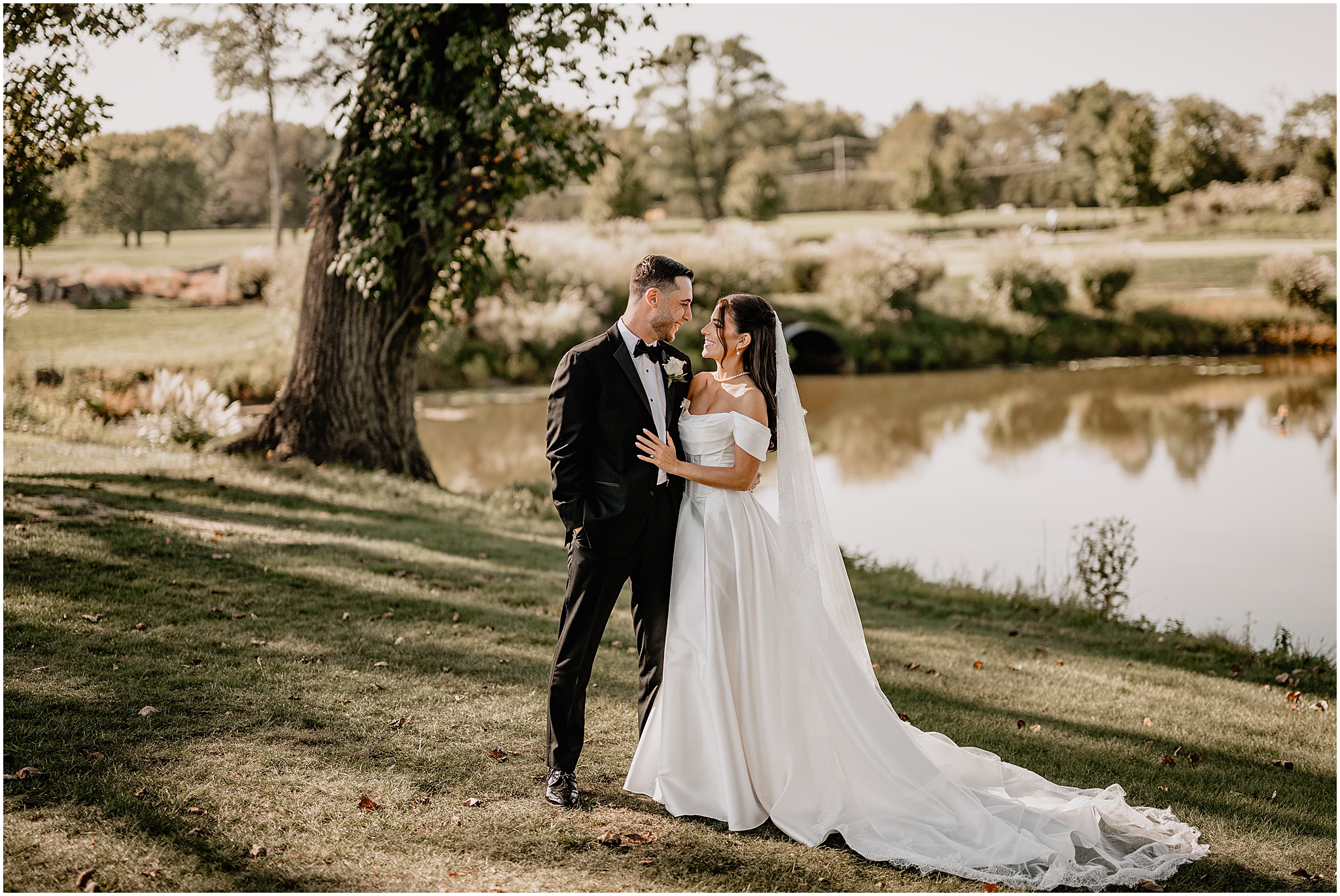 Bride and groom sharing a quiet moment together outside during their Tillinghouse Wedding portraits.