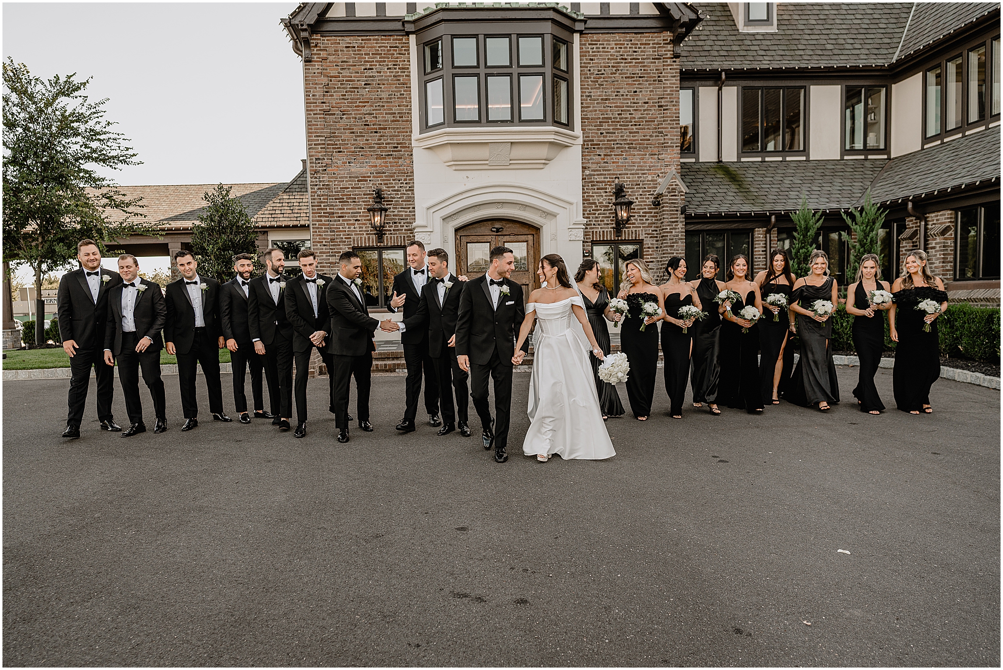 Bride and groom with their bridal party at their Tillinghouse Wedding.