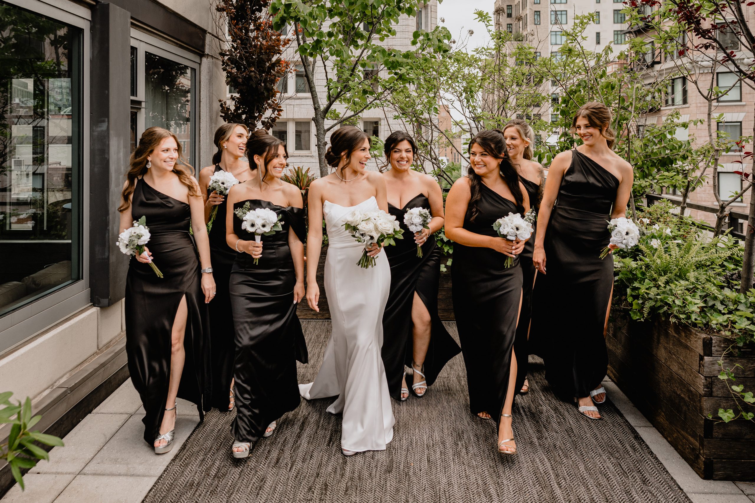 Bride with her bridesmaids during weddings at Tribeca Rooftop in New York City.