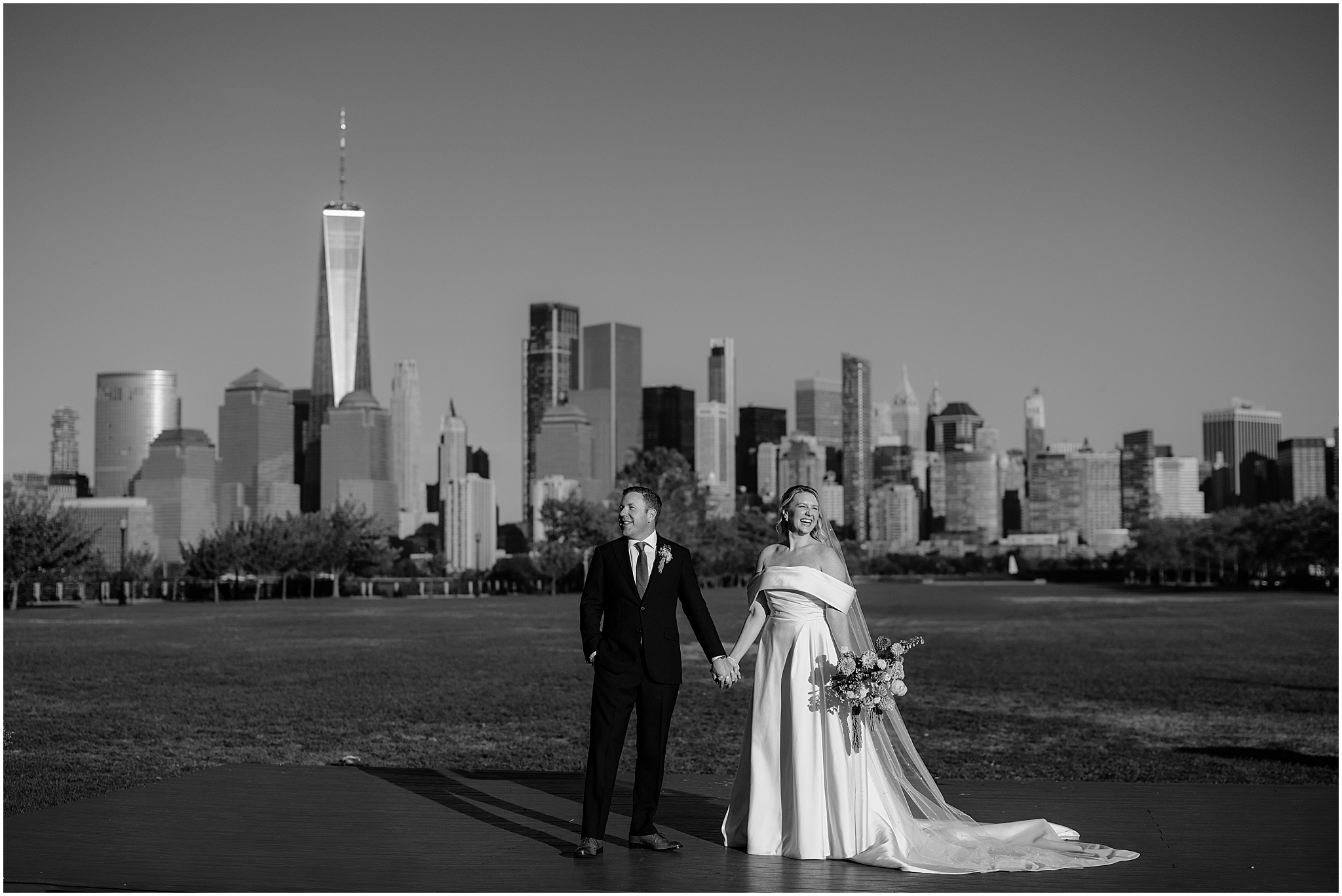 Couple’s portraits with the stunning NYC skyline as the backdrop at their Colorful Fall Wedding at Liberty House.