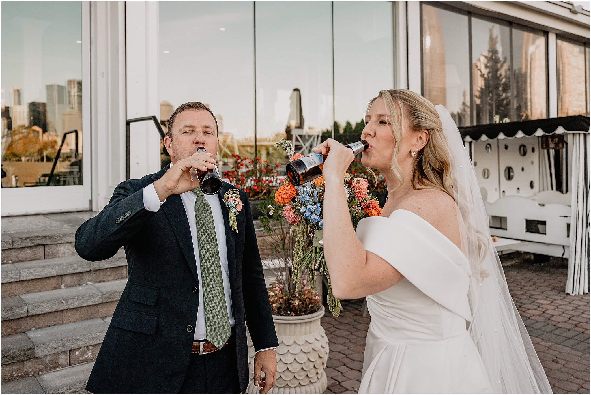 Couple enjoying a beer together before their Colorful Fall Wedding at Liberty House.