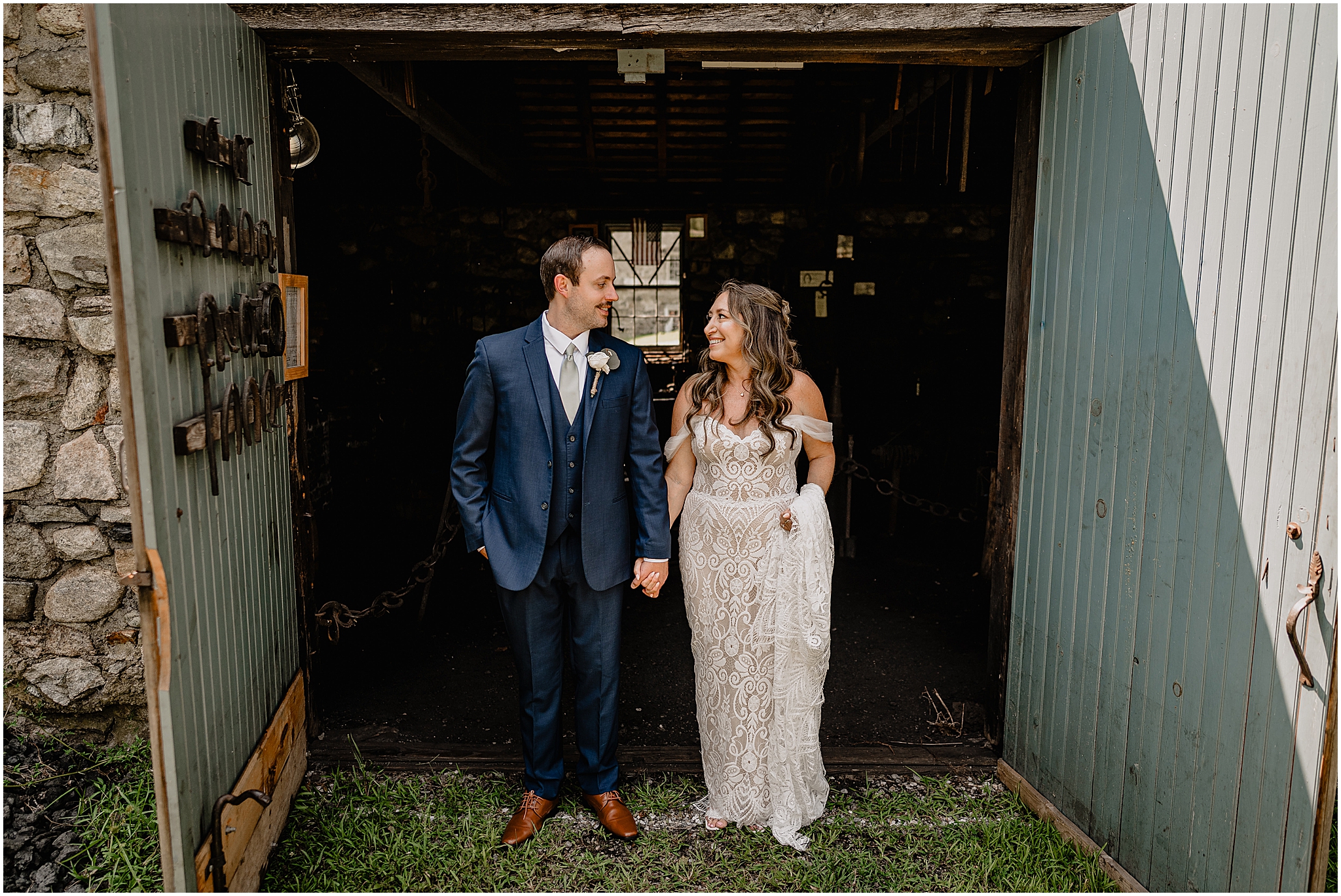 Stephanie and Ryan sharing a joyful moment during their summer wedding at Waterloo Village.