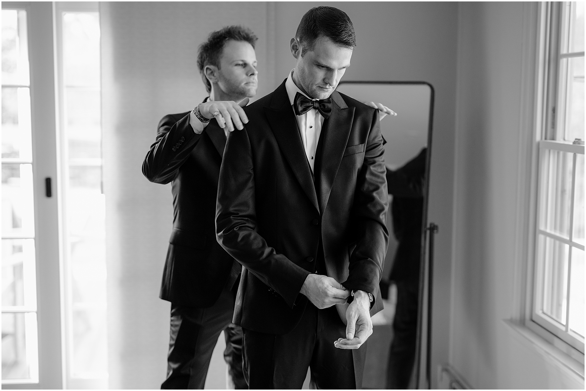 Groom getting ready before their fall wedding at Crossed Keys Estate.