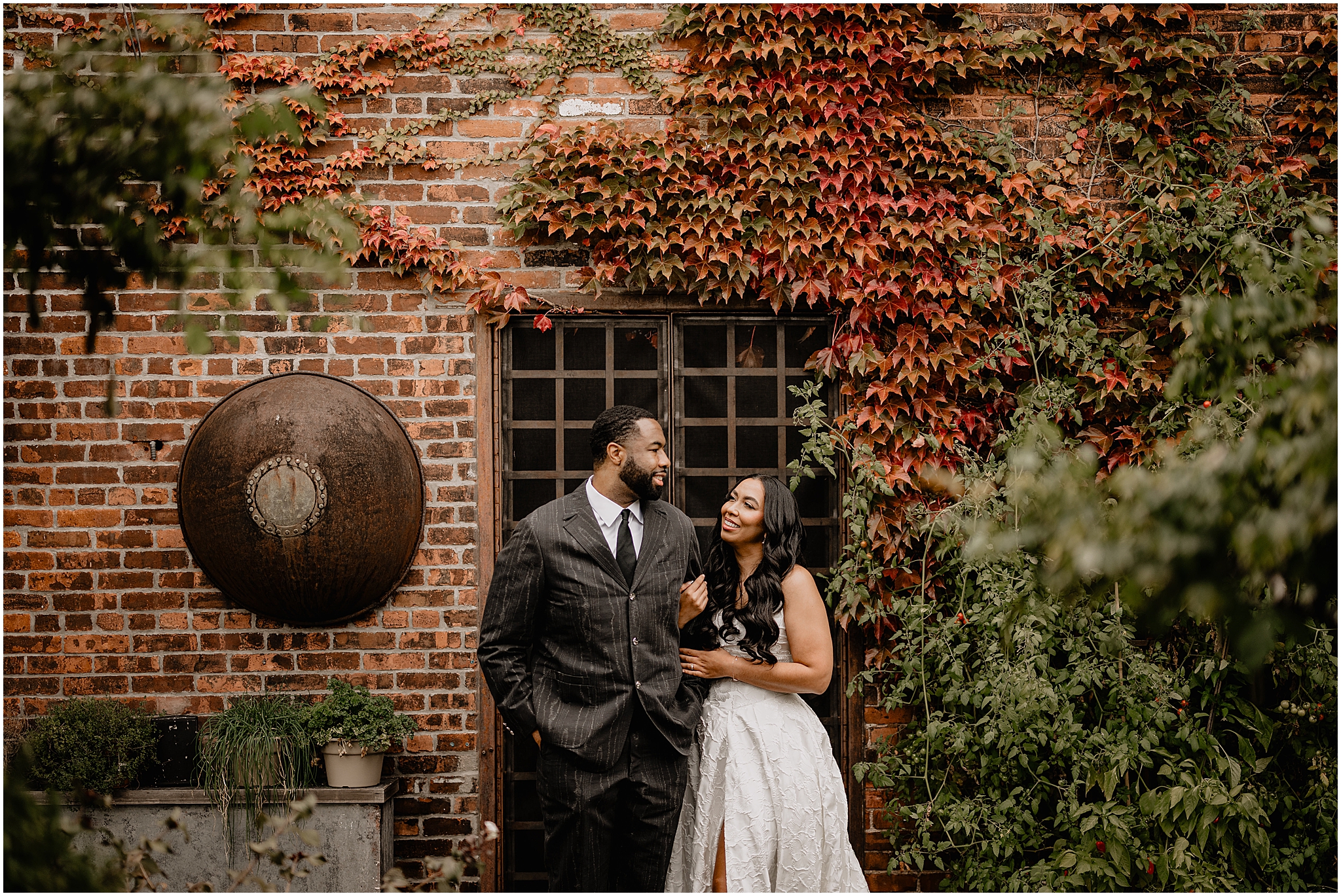 Couple portrait during their Intimate Fall Wedding at The Foundry LIC, surrounded by vibrant autumn foliage and natural beauty.
