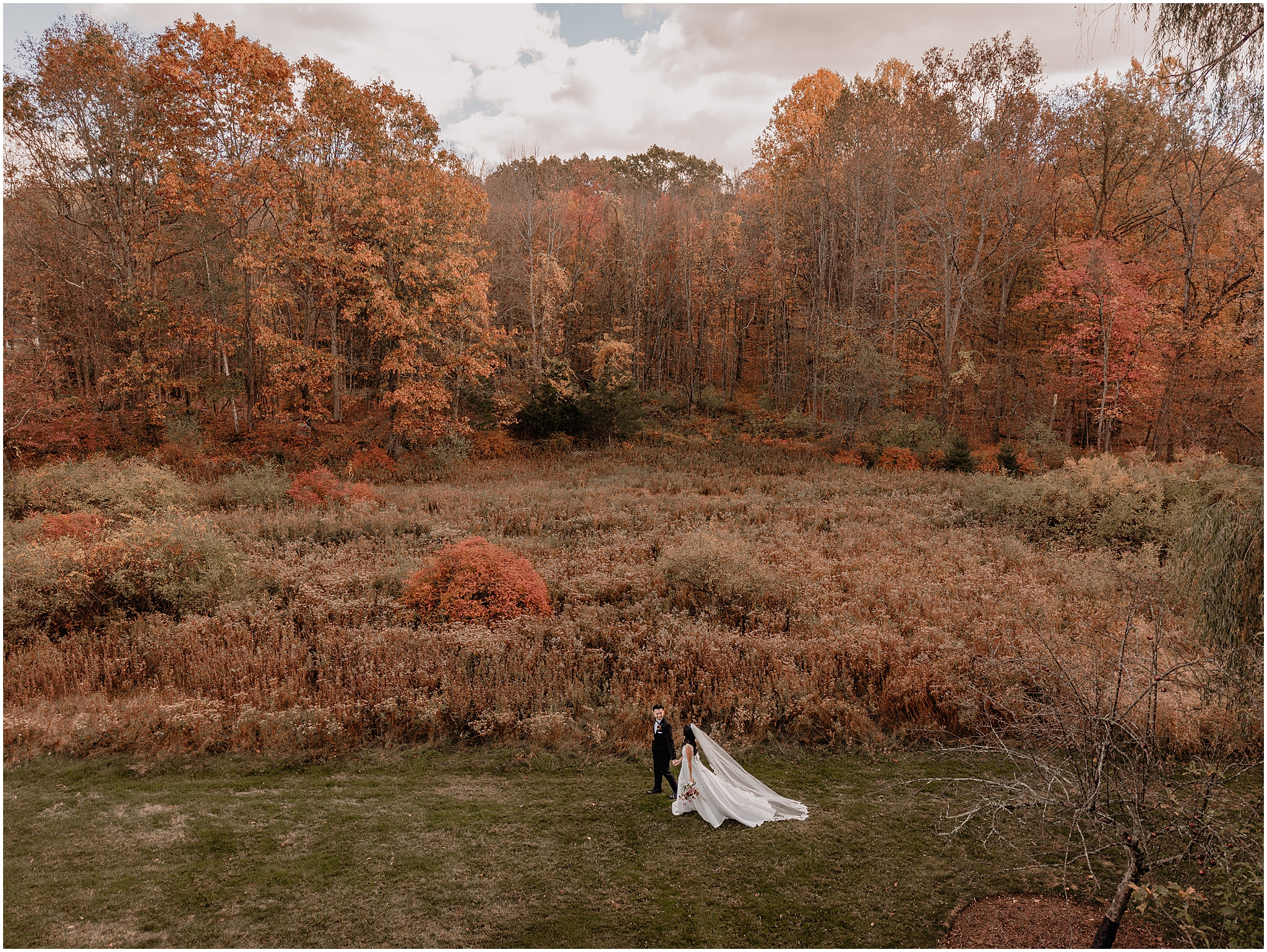 Couple portraits during their fall wedding at Perona Farms Reserve, showcasing their love and connection amidst the beautiful autumn scenery.