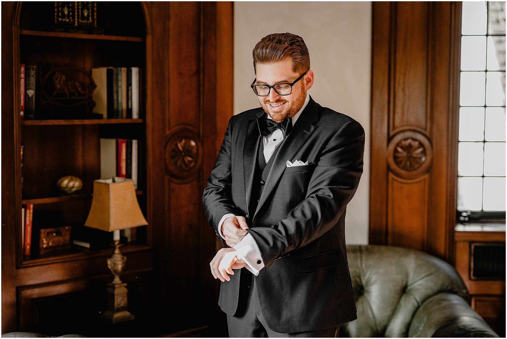 Groom getting ready before their halloween wedding at Pleasantdale Chateau