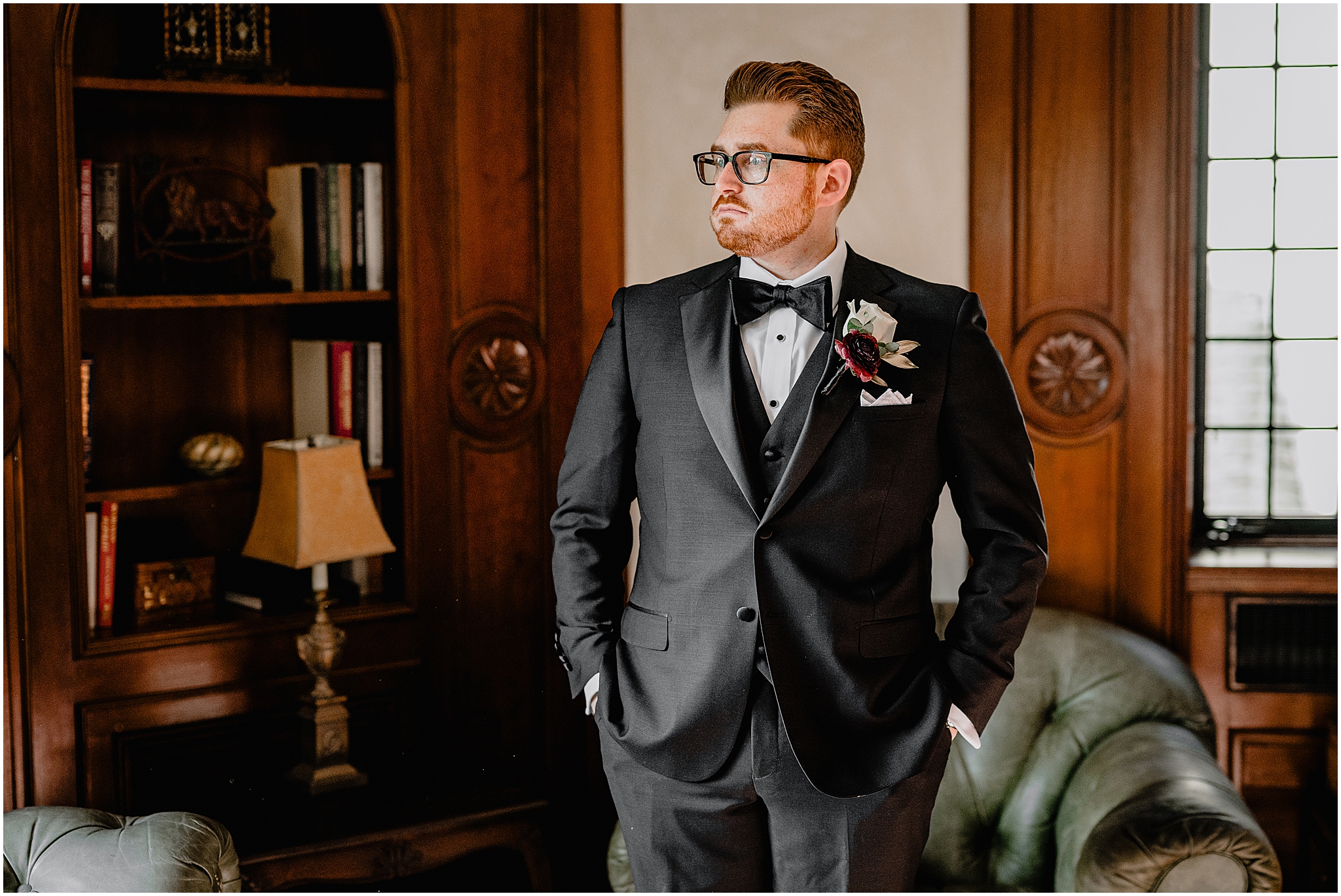Groom getting ready before their halloween wedding at Pleasantdale Chateau