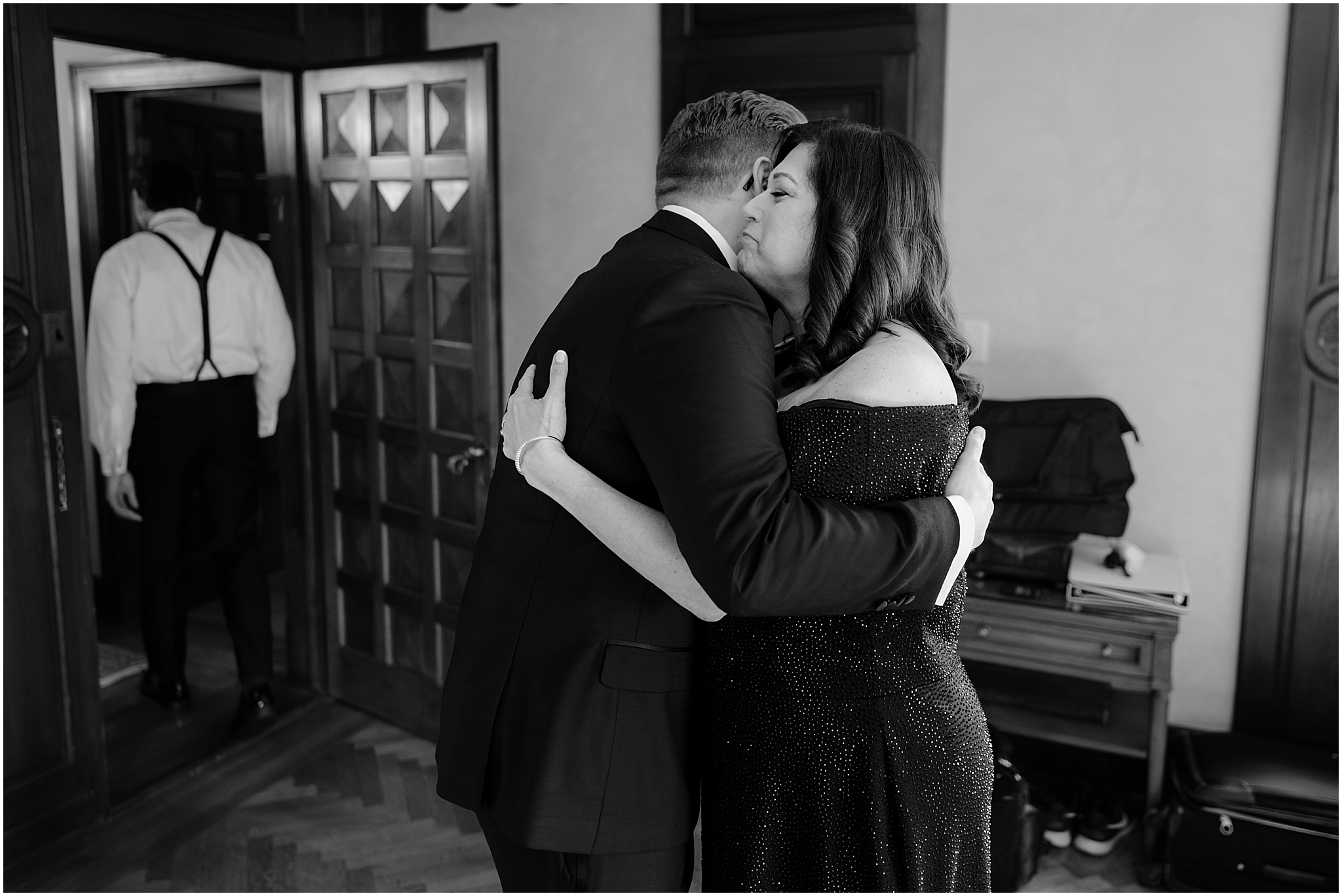 Groom getting ready before their halloween wedding at Pleasantdale Chateau