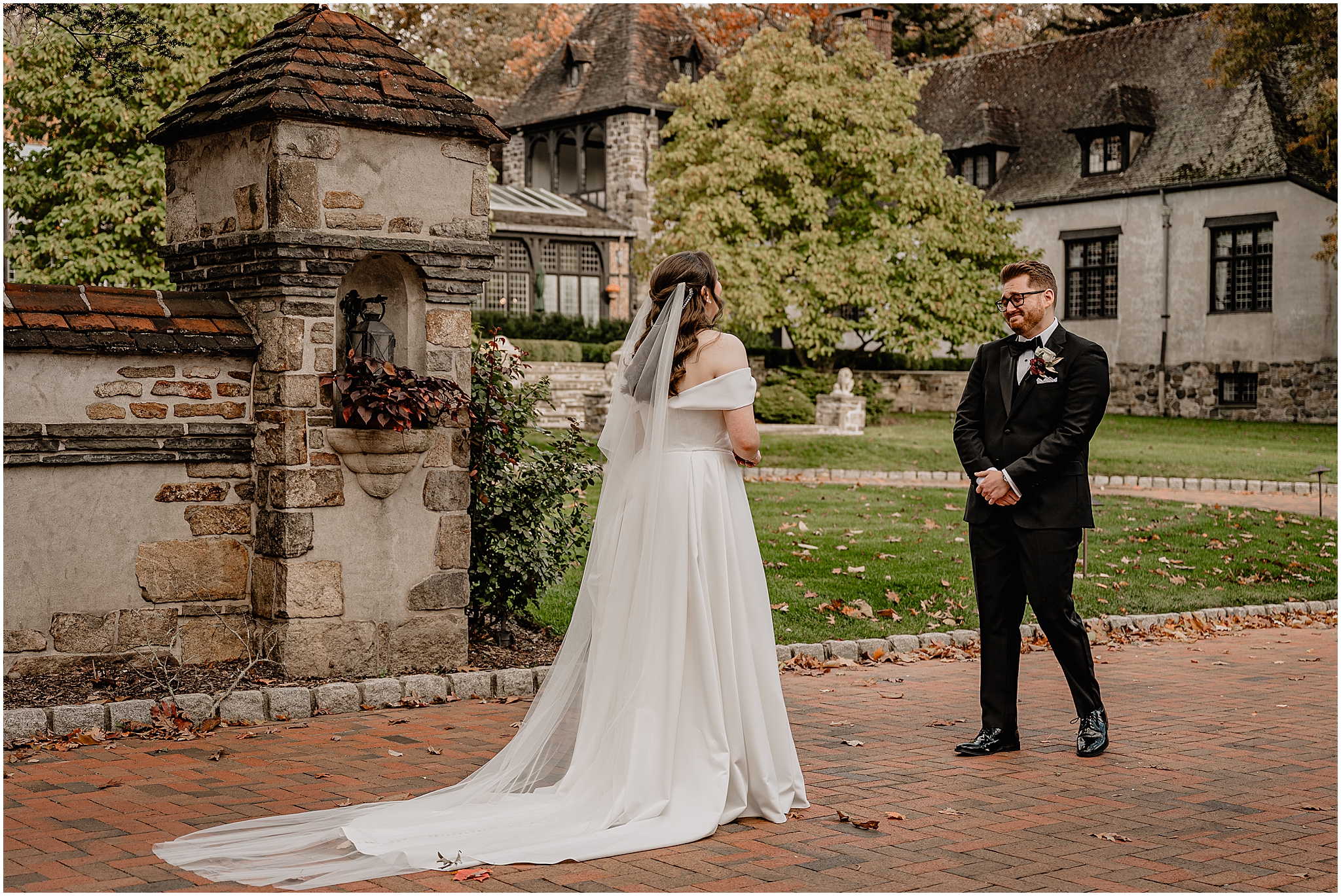 Couple's first look before their halloween wedding at Pleasantdale Chateau.