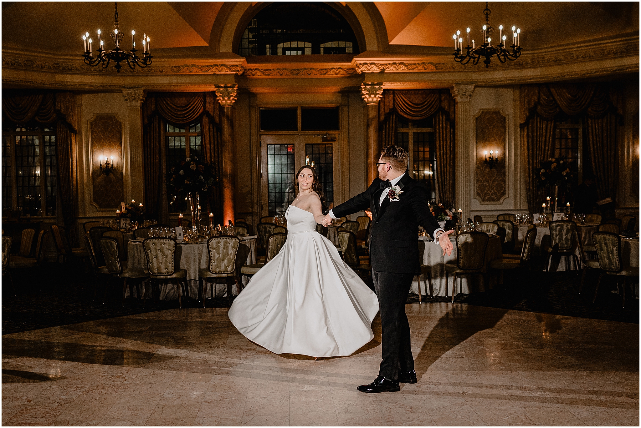 Couple dancing during their reception at their halloween wedding at Pleasantdale Chateau.
