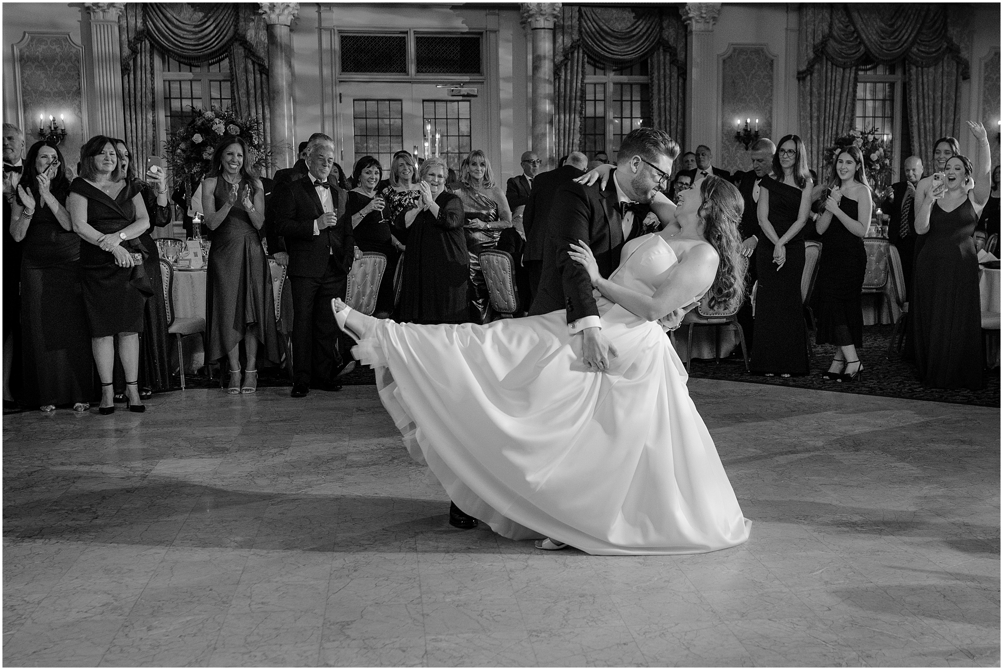 Couple dancing during their reception at their halloween wedding at Pleasantdale Chateau.