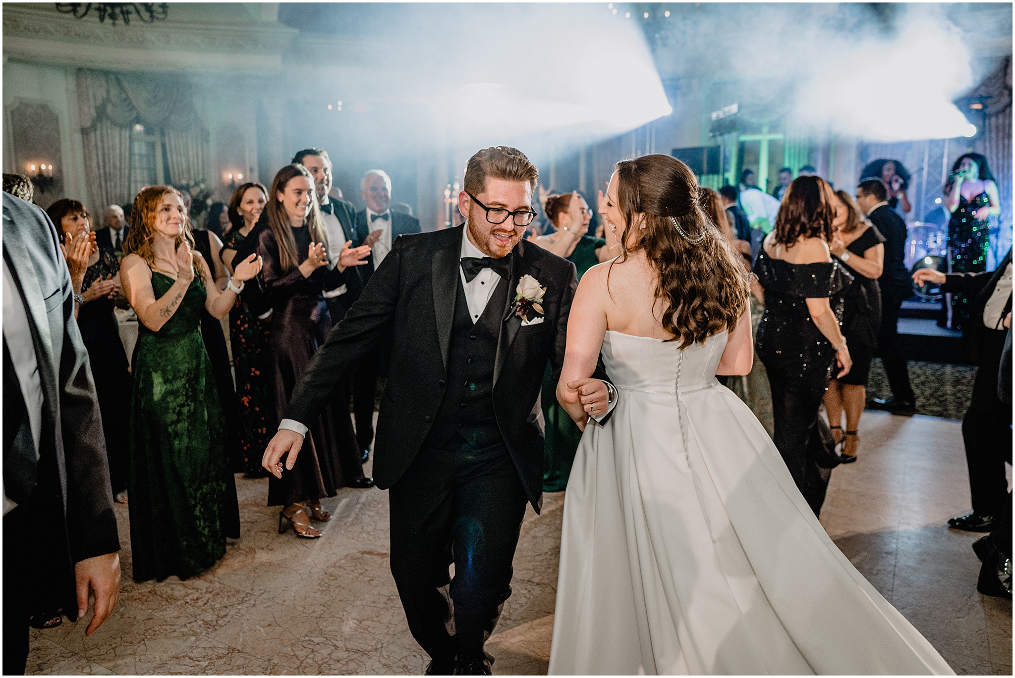Couple dancing during their reception at their halloween wedding at Pleasantdale Chateau.