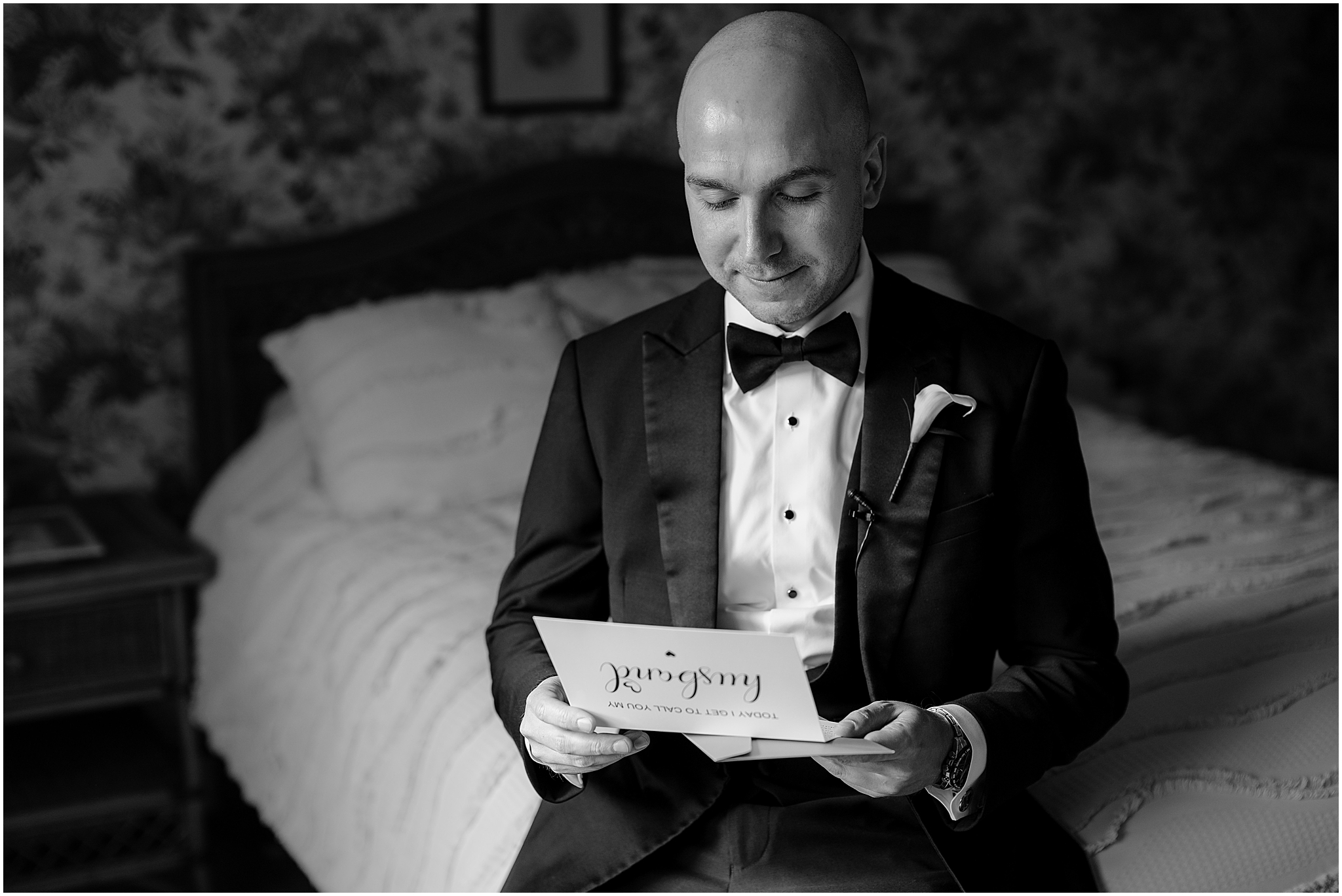 Groom reading a letter before his Westmount Country Club wedding