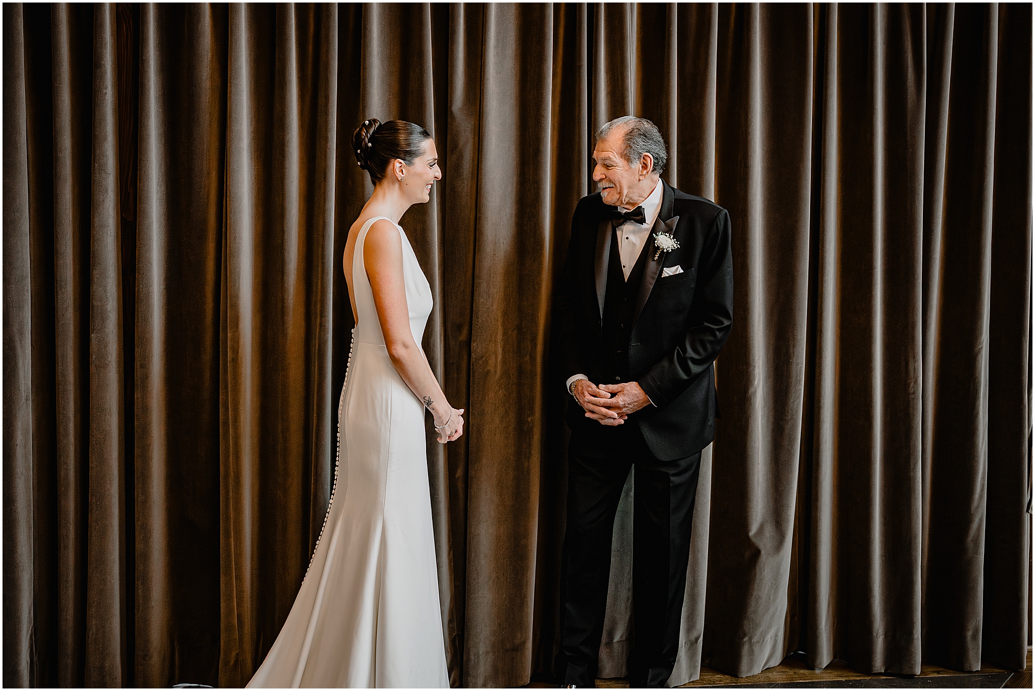Bride's first look with her father before their winter wedding at Crossed Keys Estate.