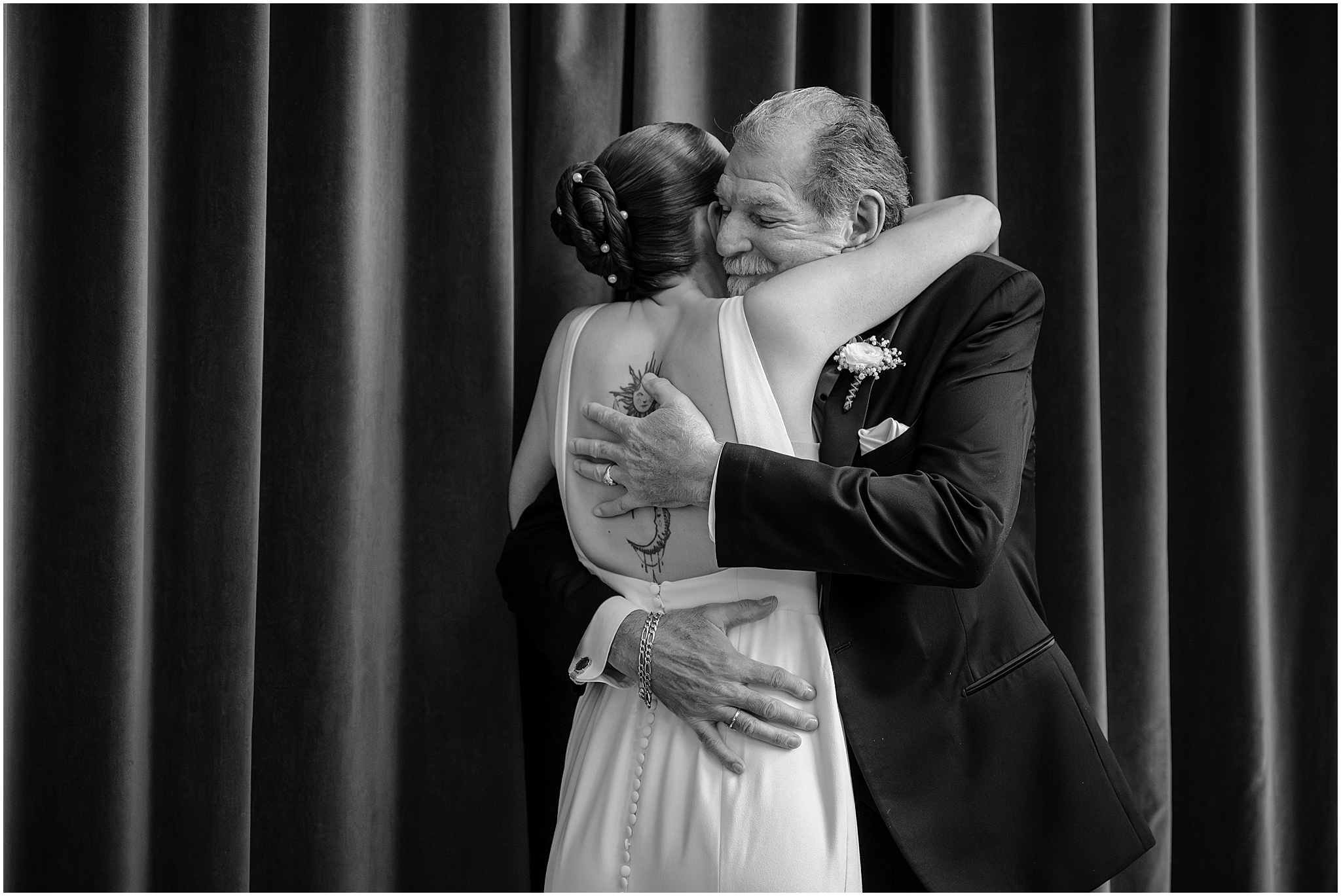 Bride hugging her father before their winter wedding at Crossed Keys Estate.