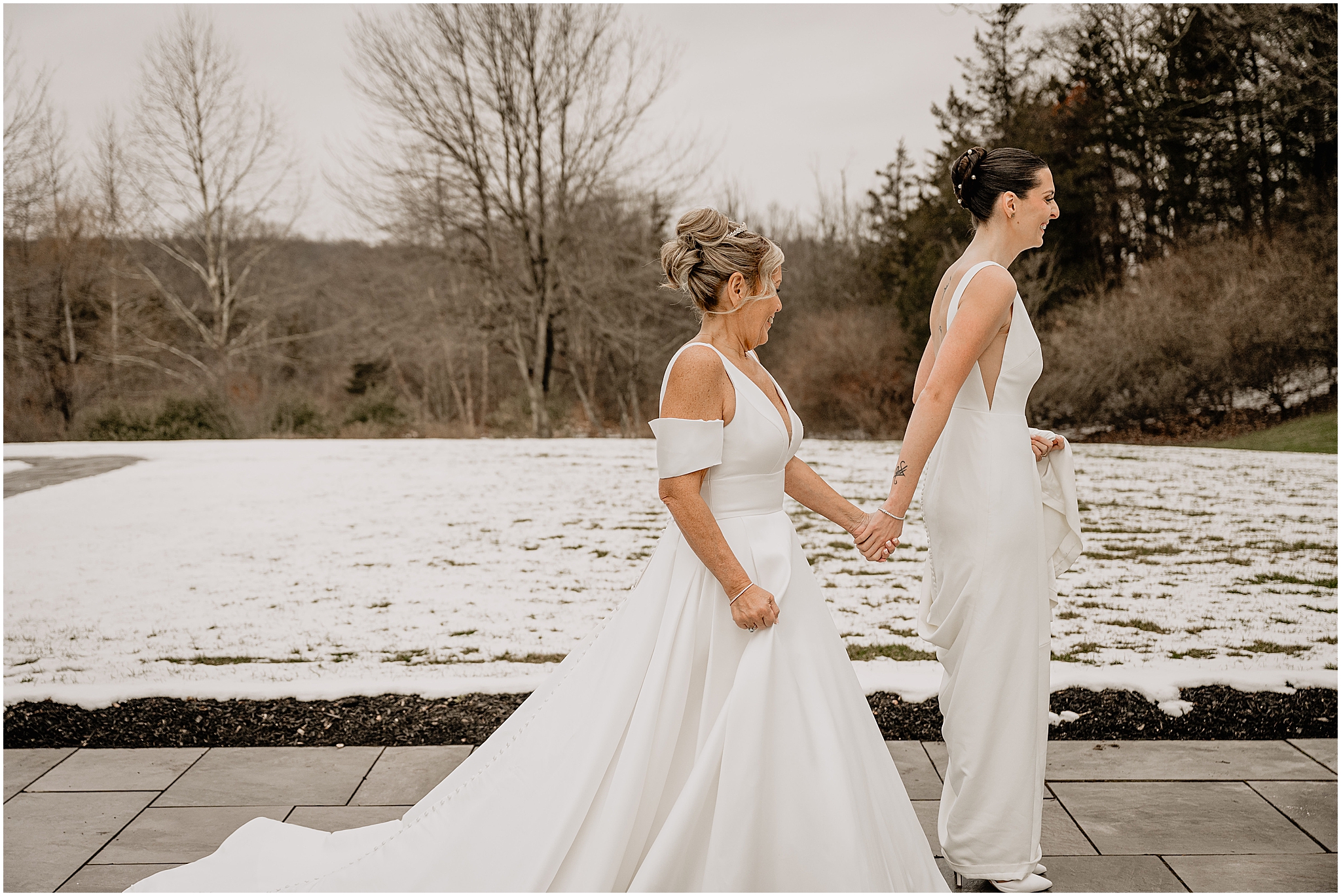 Brides having their first look before their winter wedding at Crossed Keys Estate.
