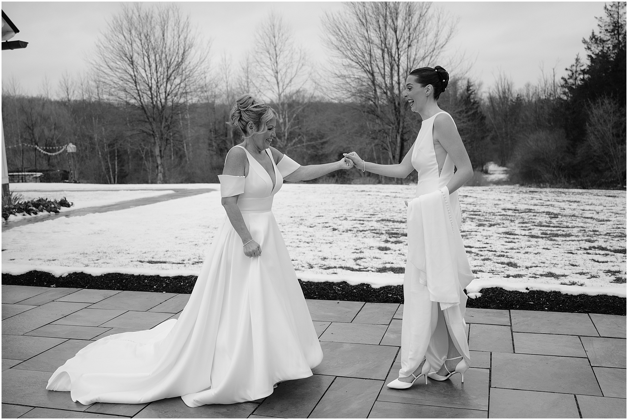 Brides having their first look before their winter wedding at Crossed Keys Estate.