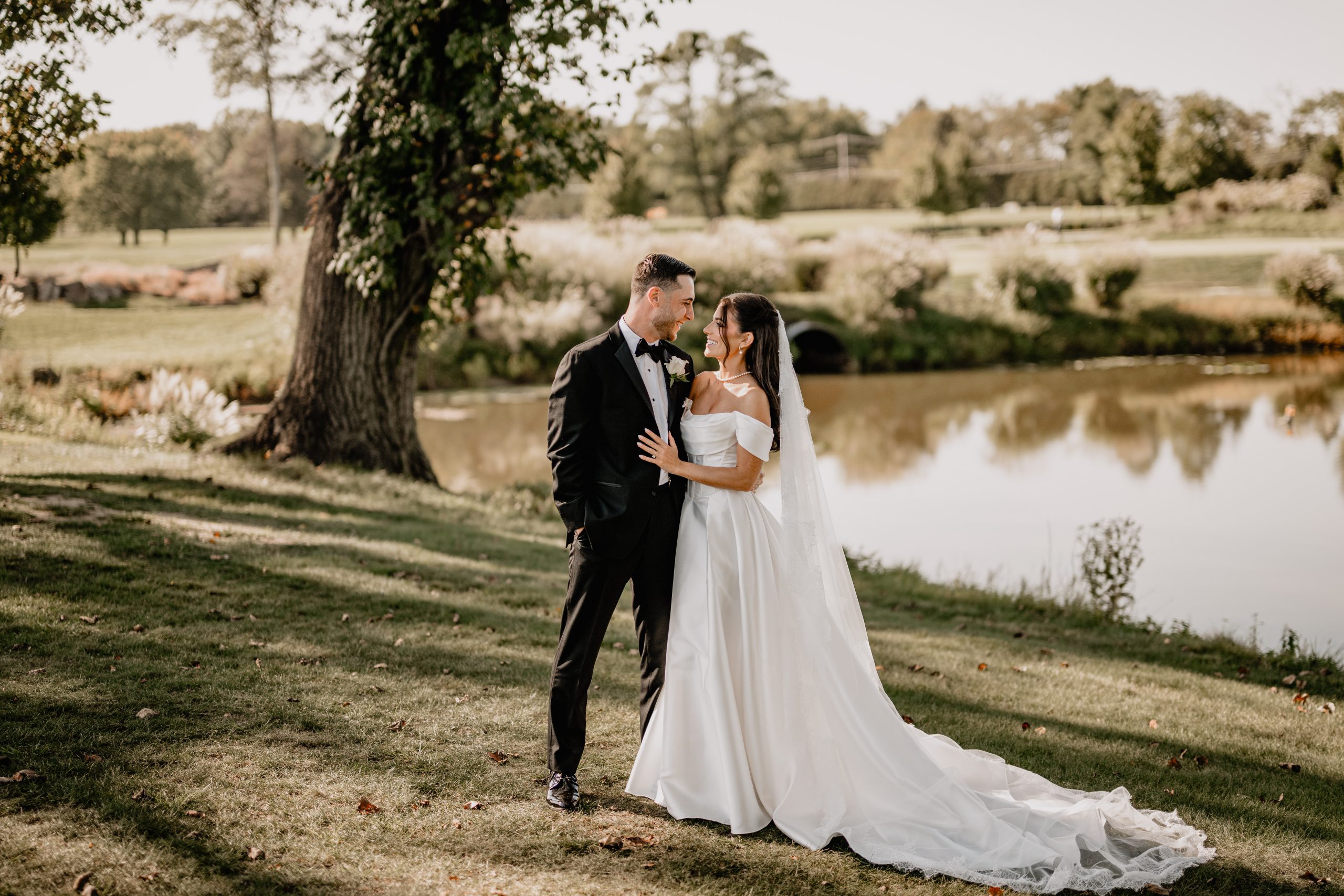 Couple by the lake at one of the weddings at The Tilling House.