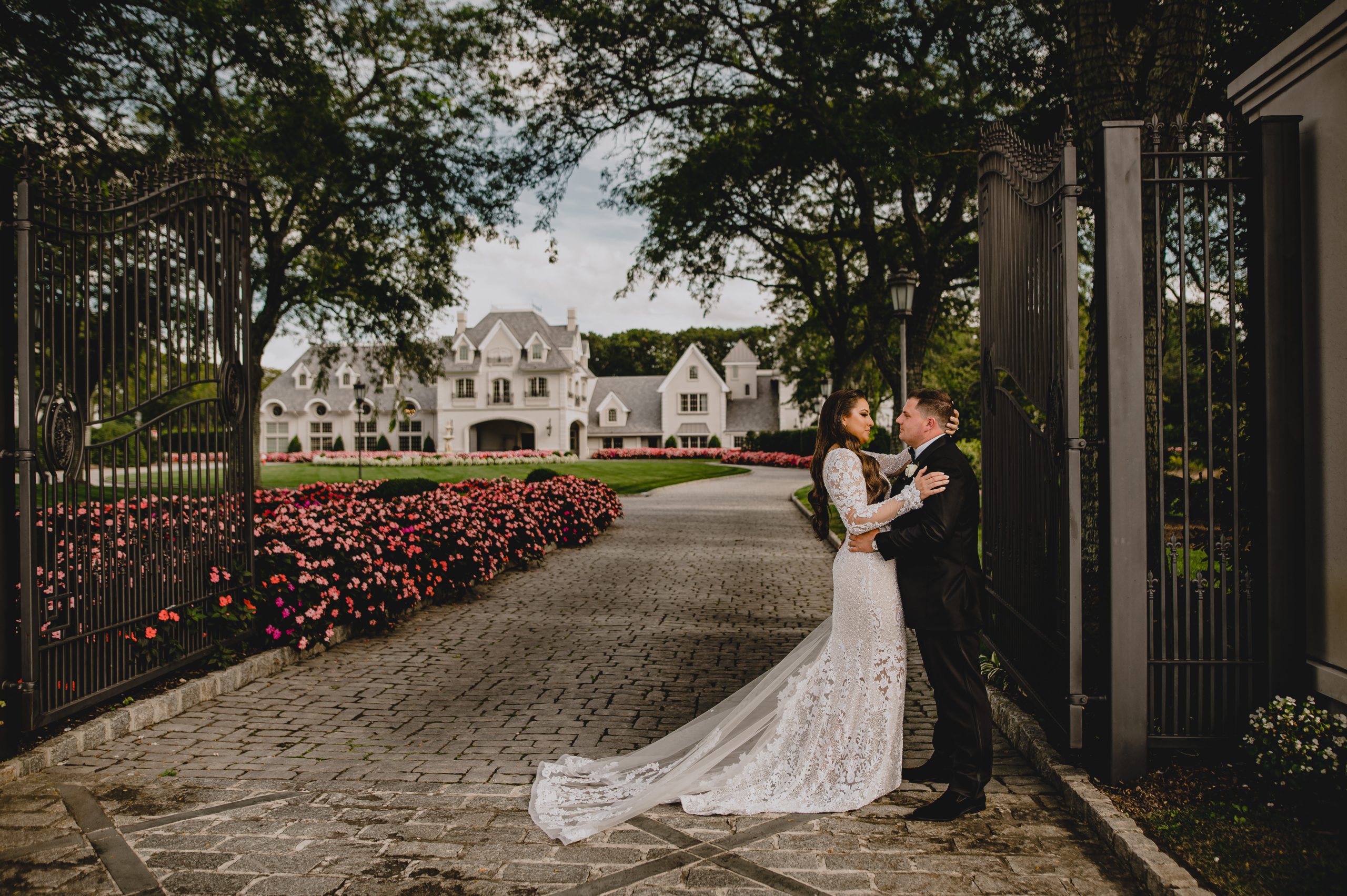 Couple by the gate on Weddings at Park Chateau.