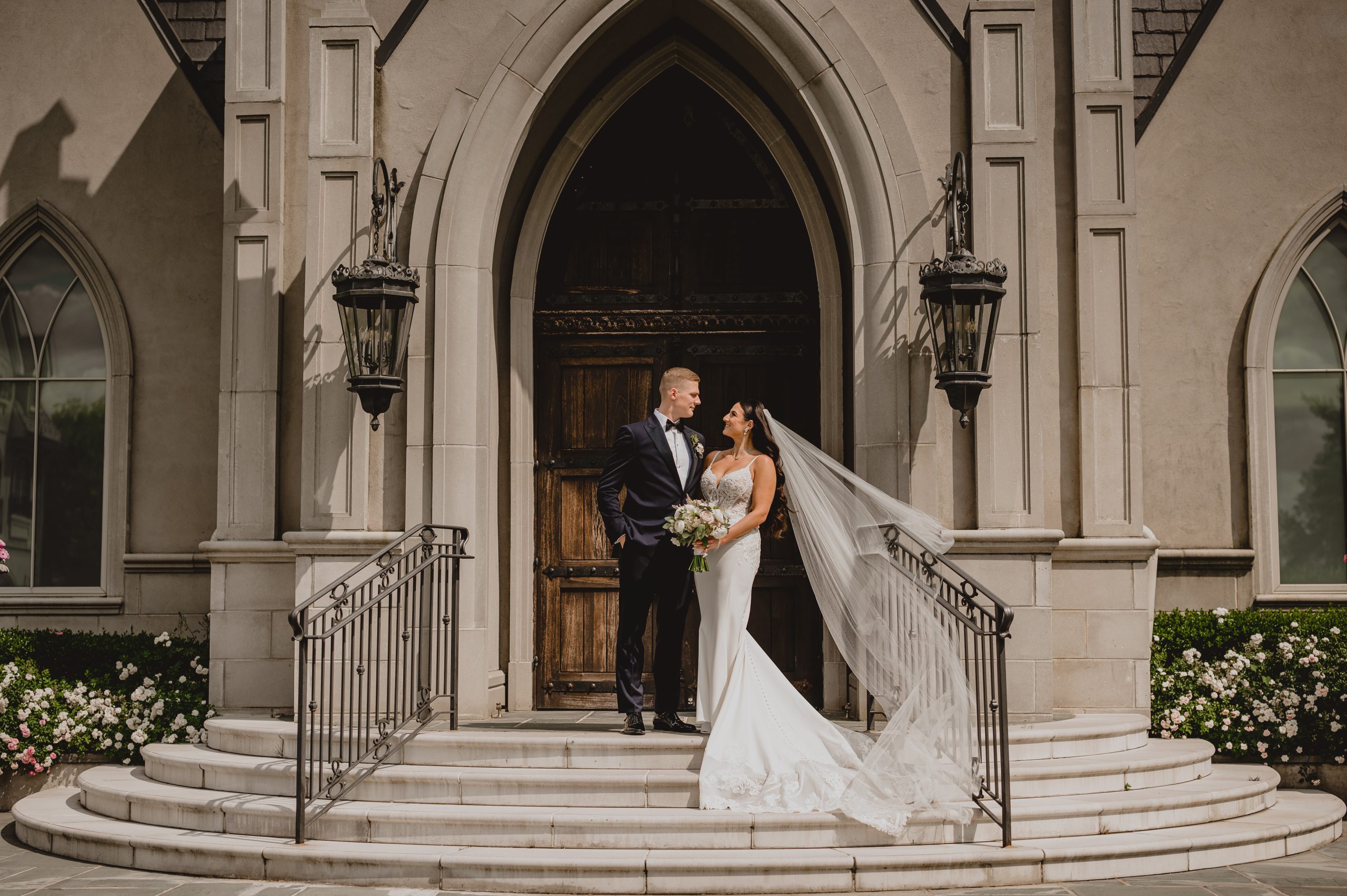 Couple in front of the church on Weddings at Park Chateau.