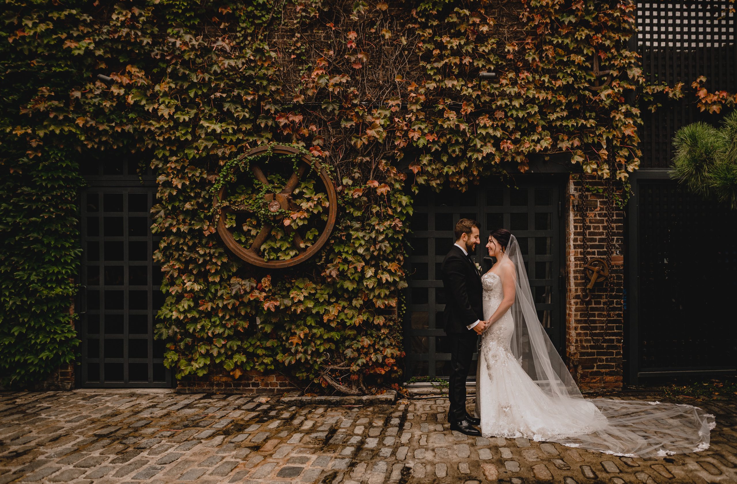 Couple holding hands and Getting Married at The Foundry.