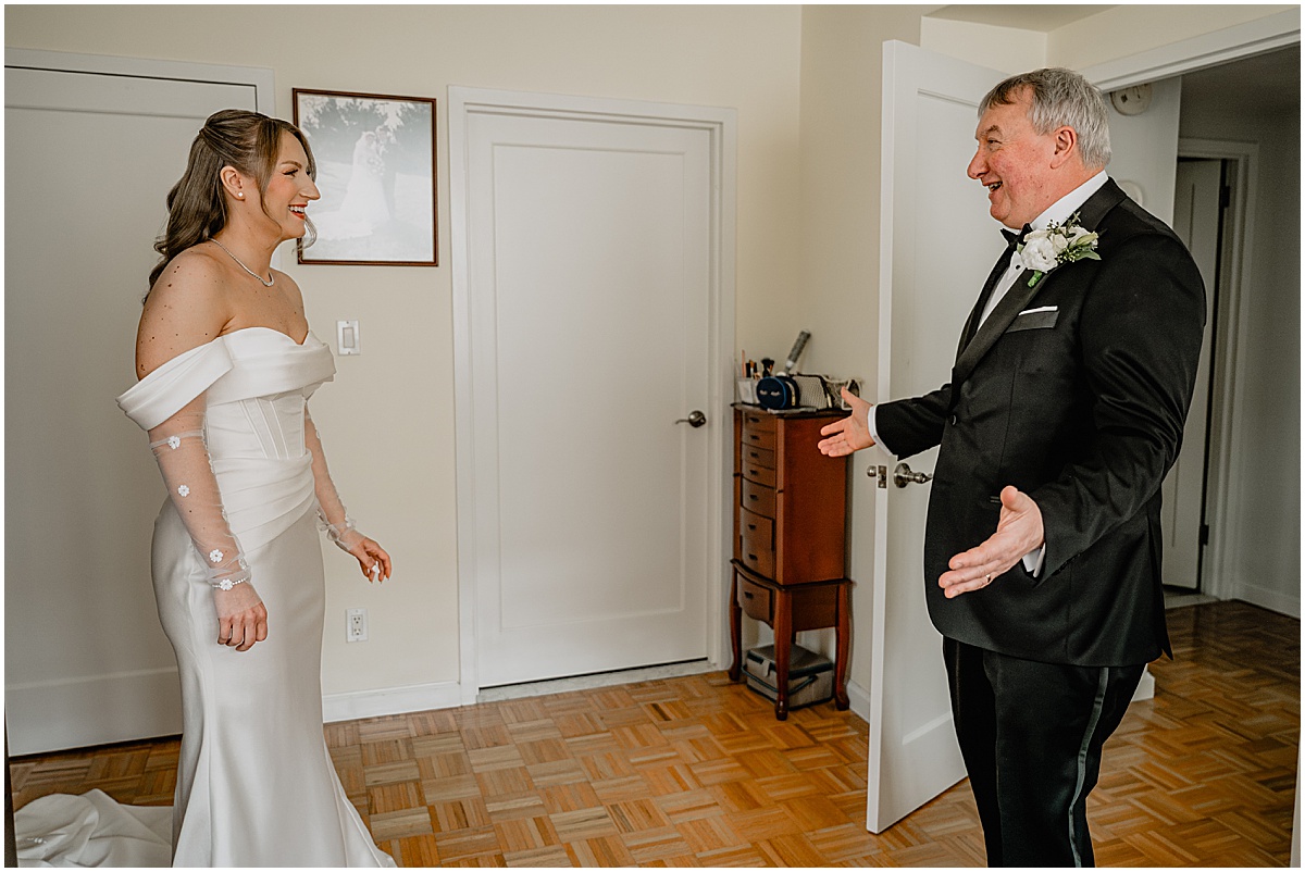 Bride seeing her father before their Crossed Keys Estate winter wedding.