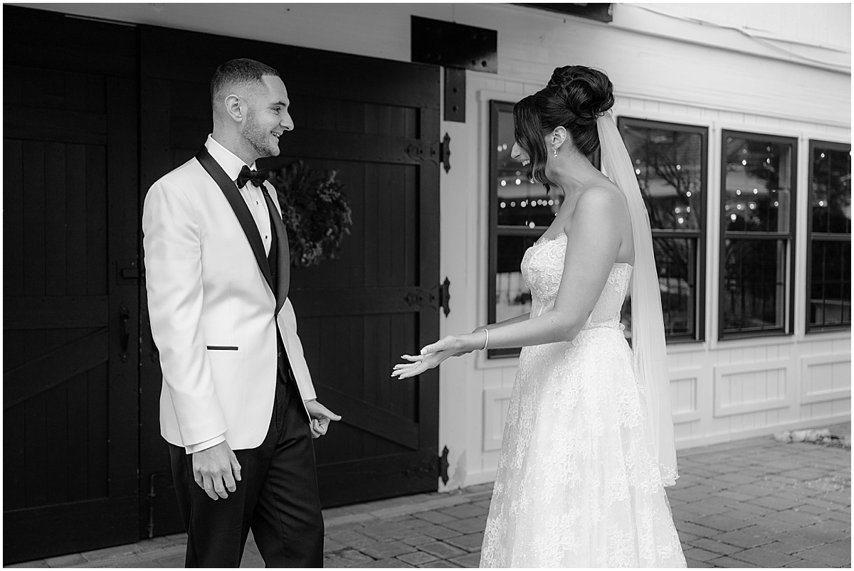 Couple's first look before their winter Hamilton Manor wedding.