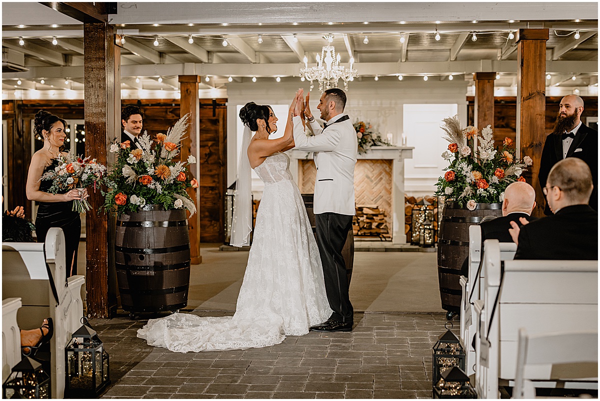 Couple during their winter Hamilton Manor wedding ceremony.