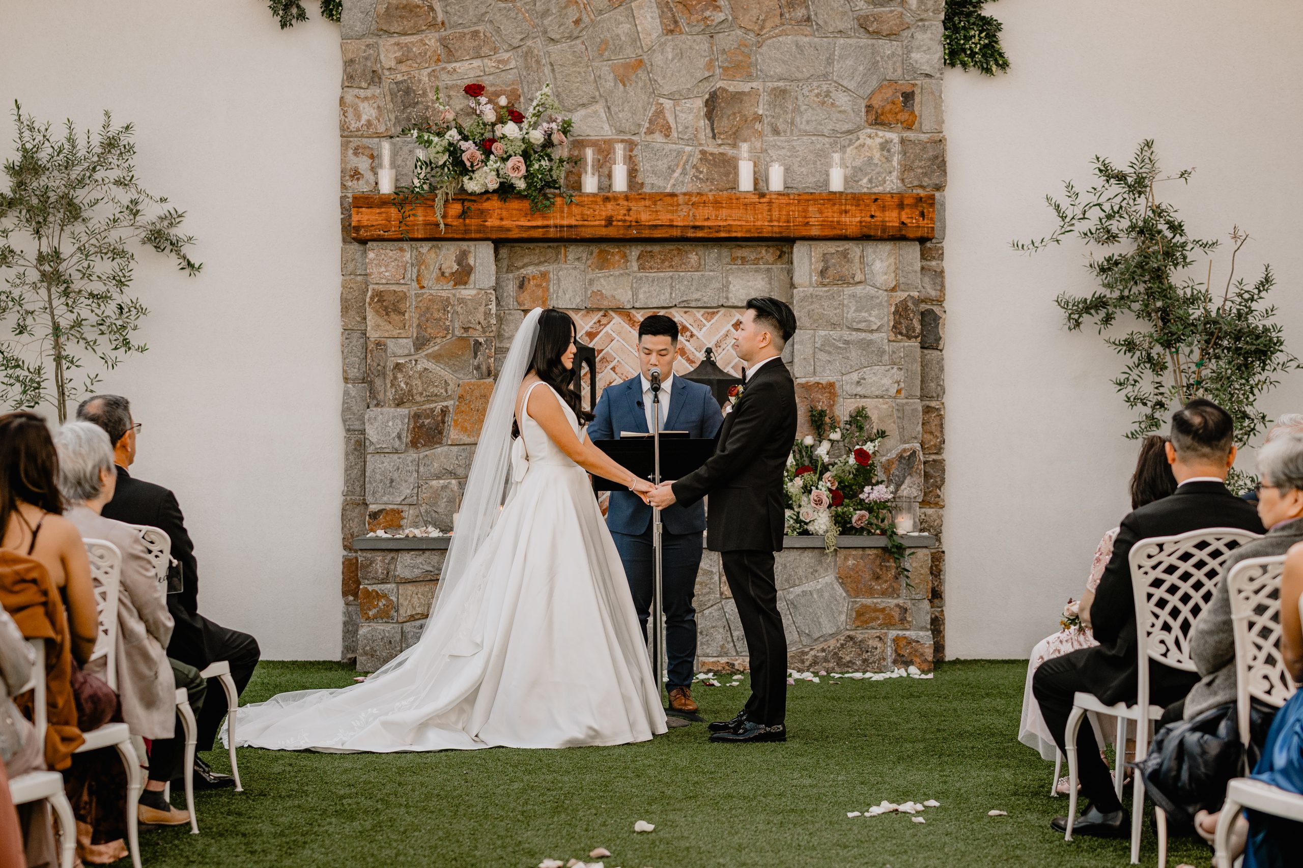 Couple at the altar at The Reserve at Perona Farms Wedding ceremony.