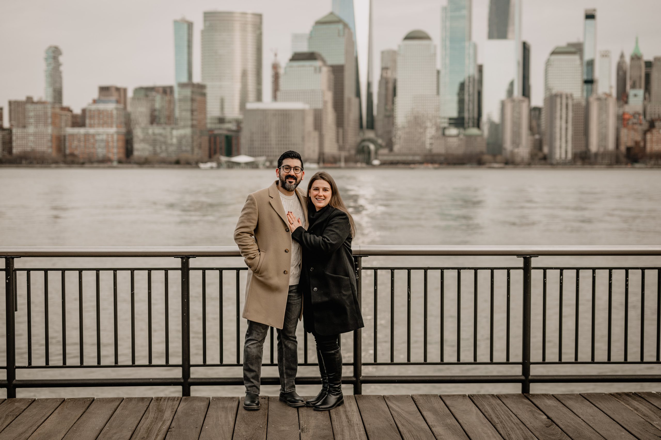 Couple at their Jersey City rooftop engagement session