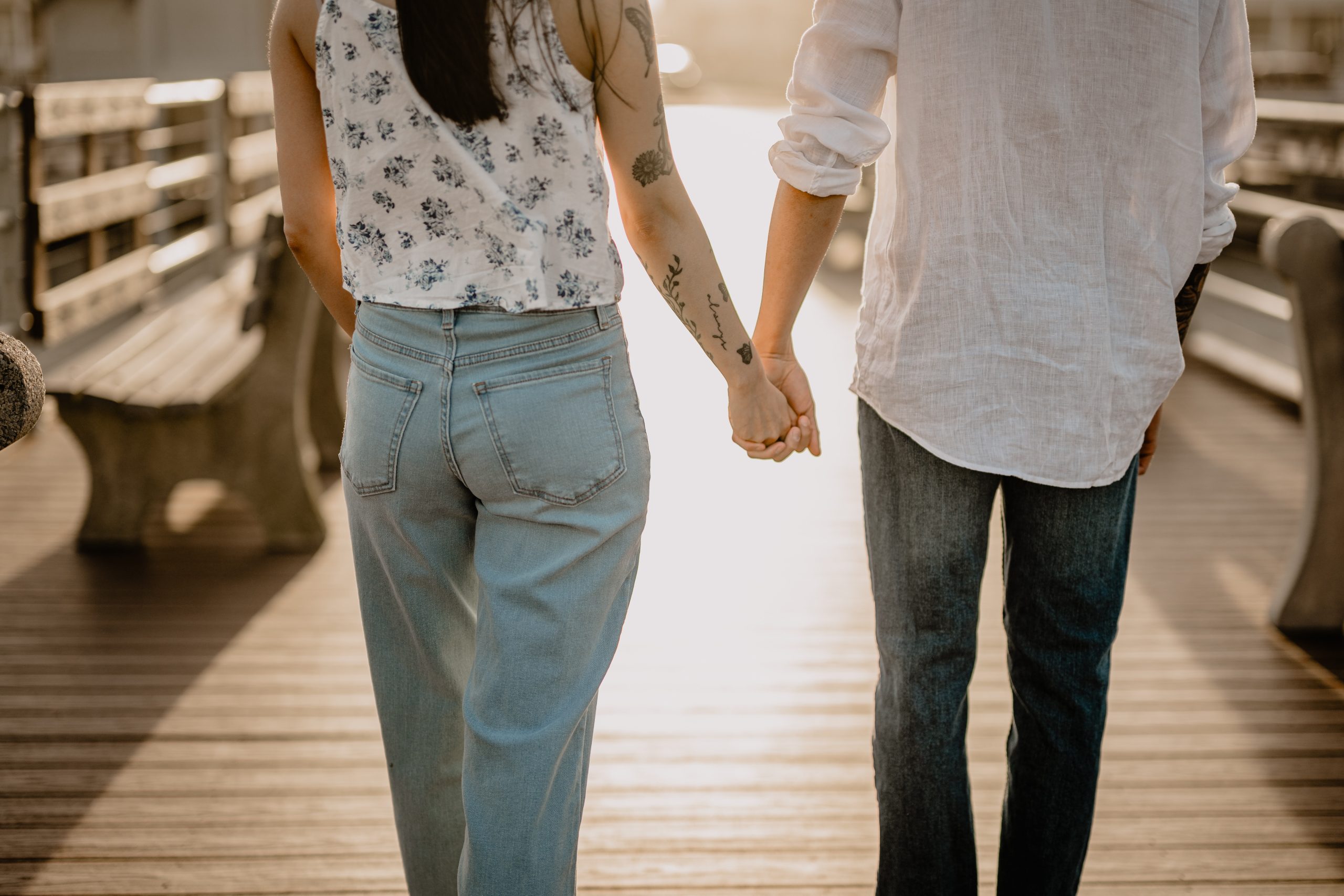Couple holding hands during their Engagement Session in Ocean Grove